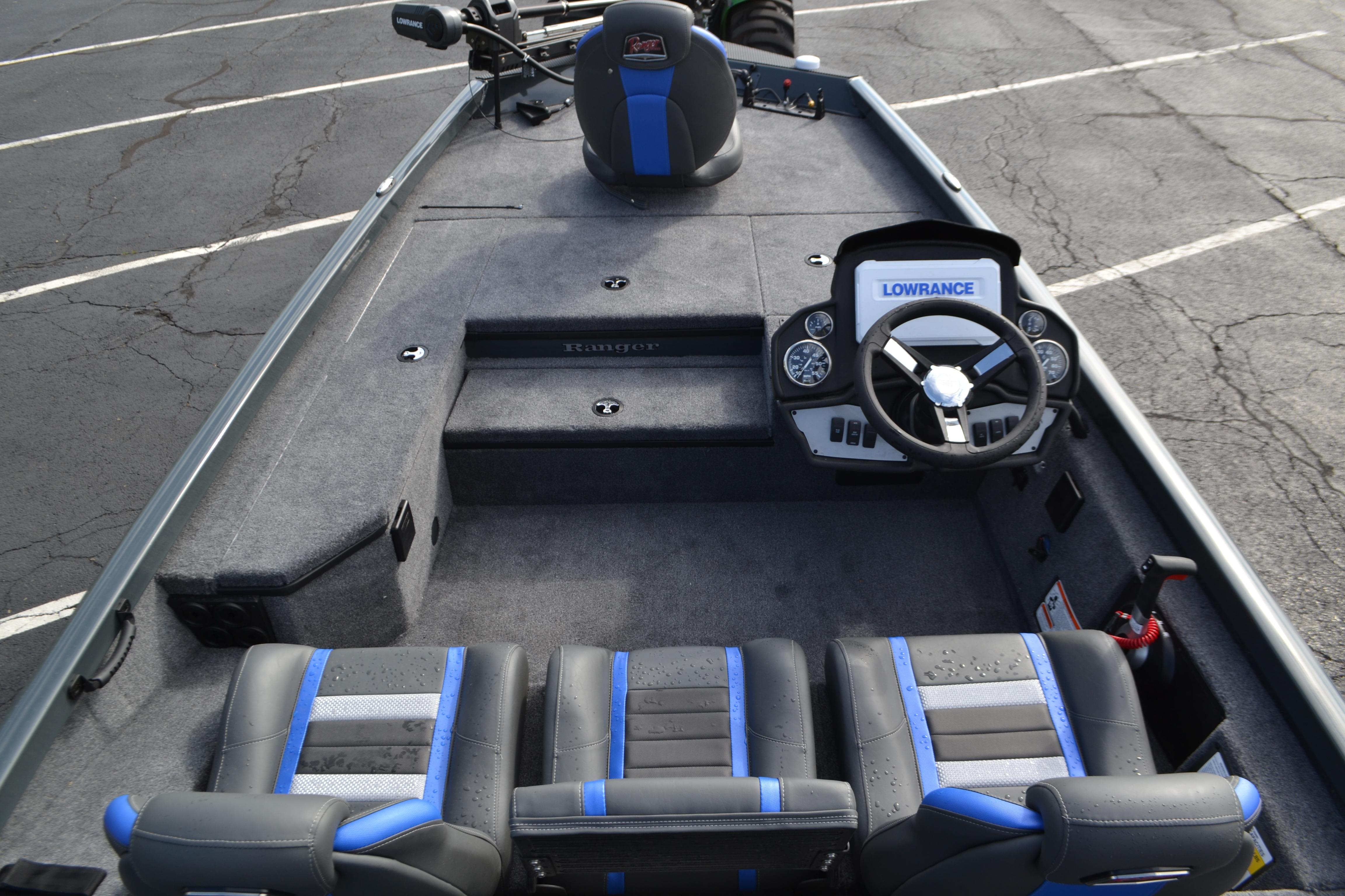 2026 Ranger RT178 boat interior with steering console and seating, featuring Lowrance electronics.