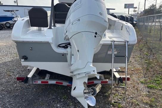 2025 Sea Pro 225FLX Sandbar boat on trailer, rear view with outboard motor.