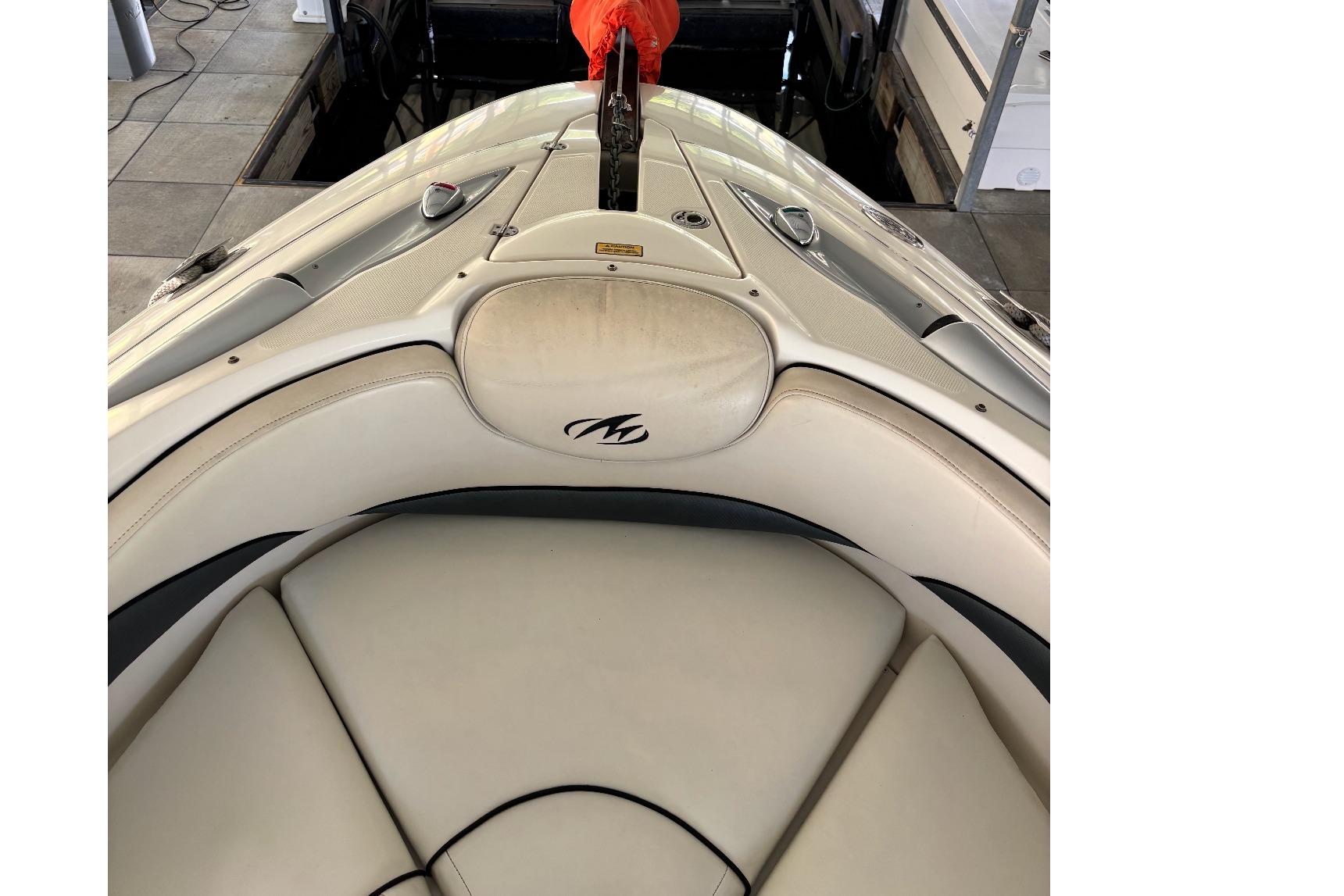 2007 Monterey 298SSX Super Sport boat interior with beige seating and logo.