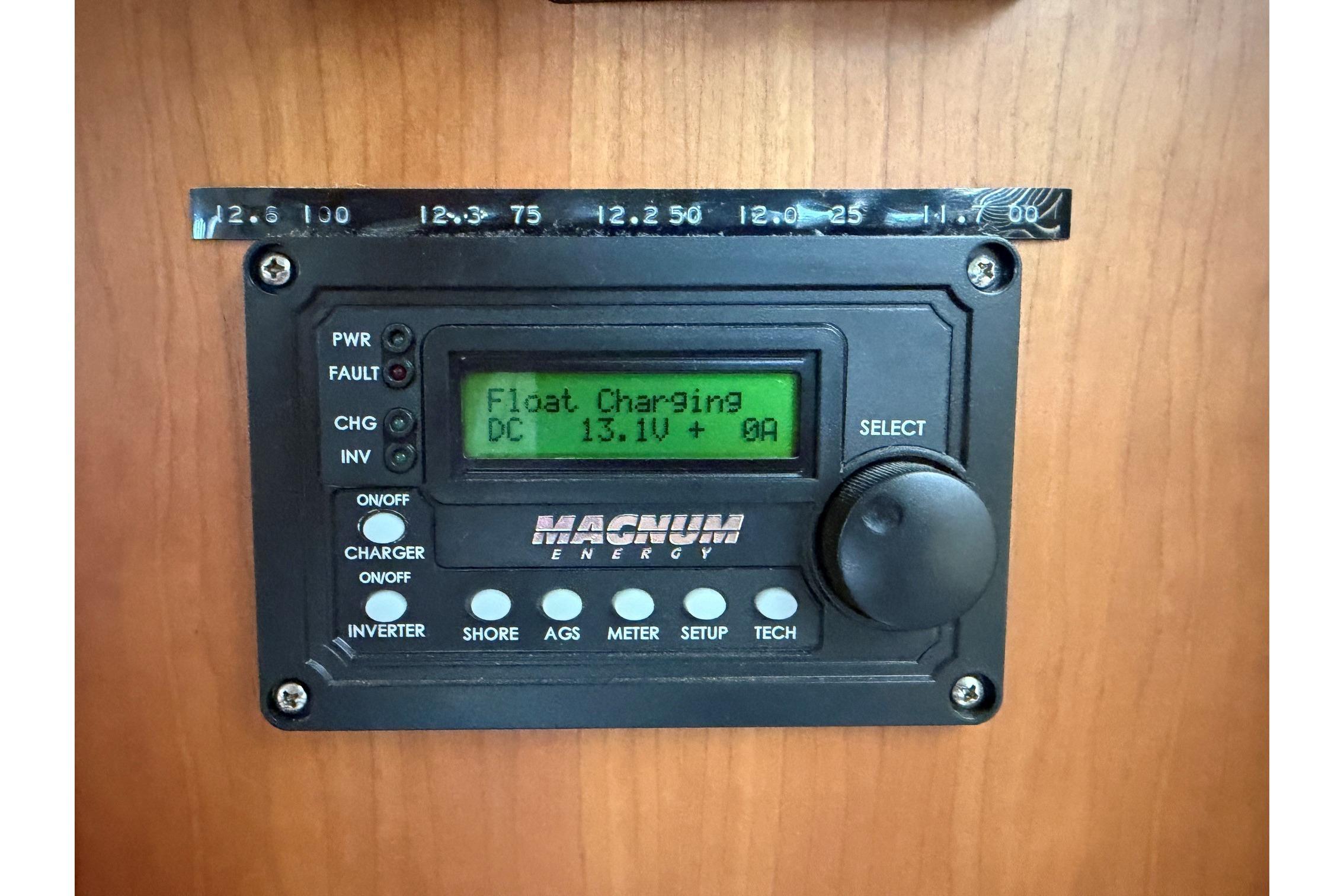 Magnum Energy control panel on 2004 Silverton 39 Motor Yacht, displaying float charging status.