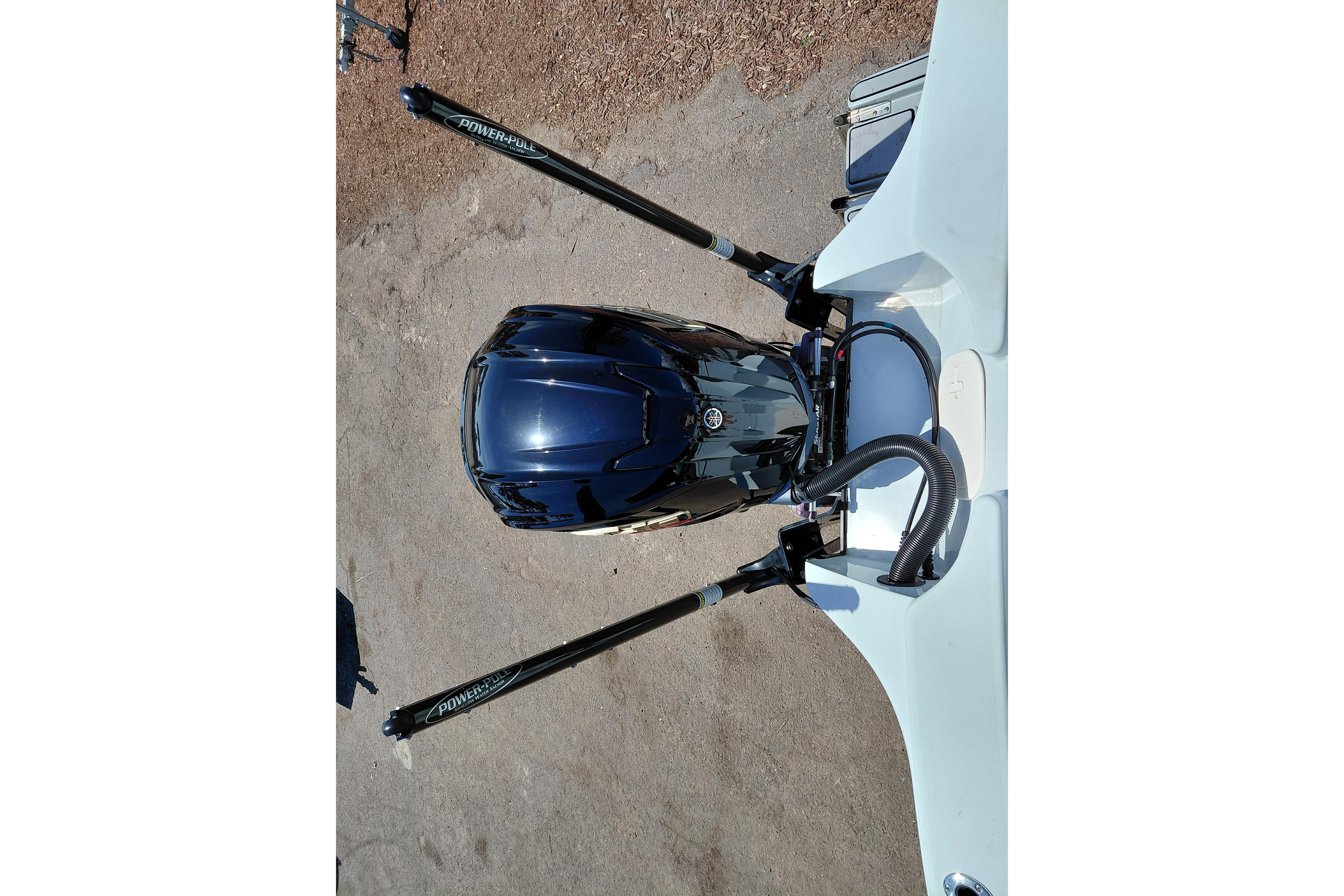Top view of a 2022 Pathfinder 2300 HPS boat engine with Power-Pole anchors.