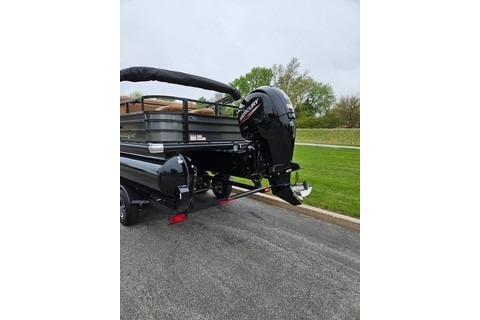 2026 Ranger 220FC boat with powerful outboard motor on a trailer.