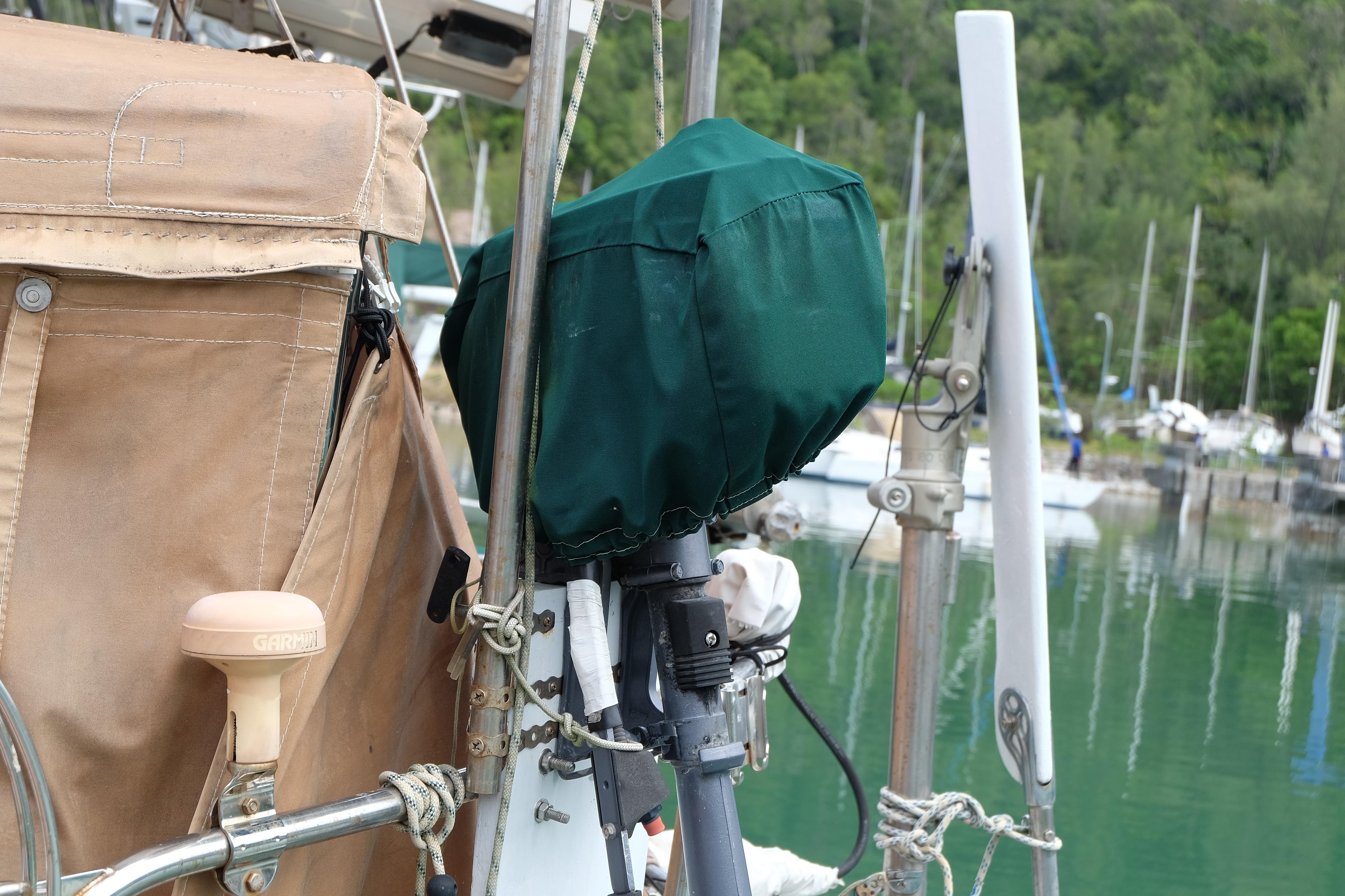 Close-up of a 1979 Westwind 35 sailboat deck with covered equipment.