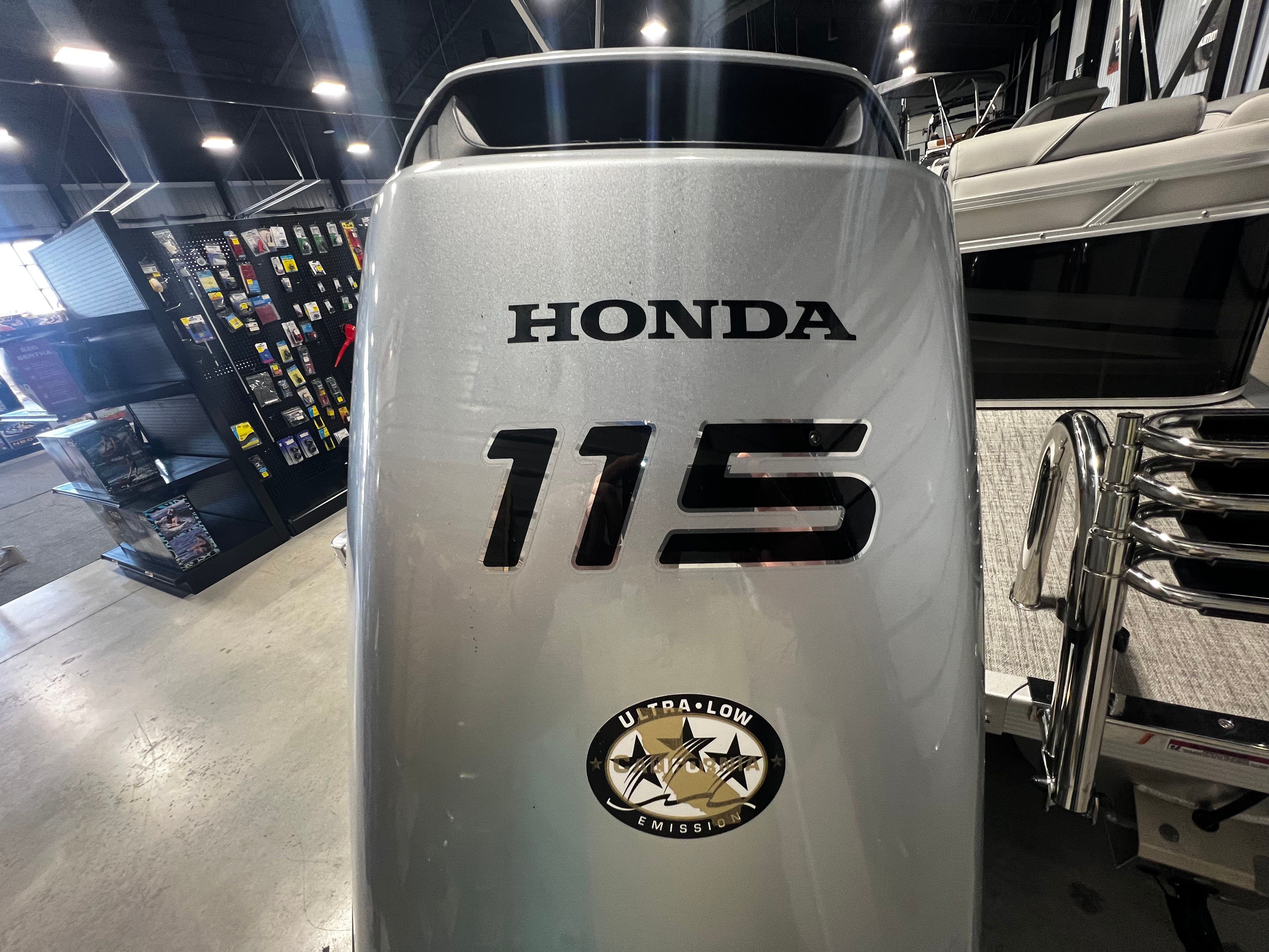 Honda 115 outboard motor on 2026 Tahoe 2180 Sport Quad Lounger.