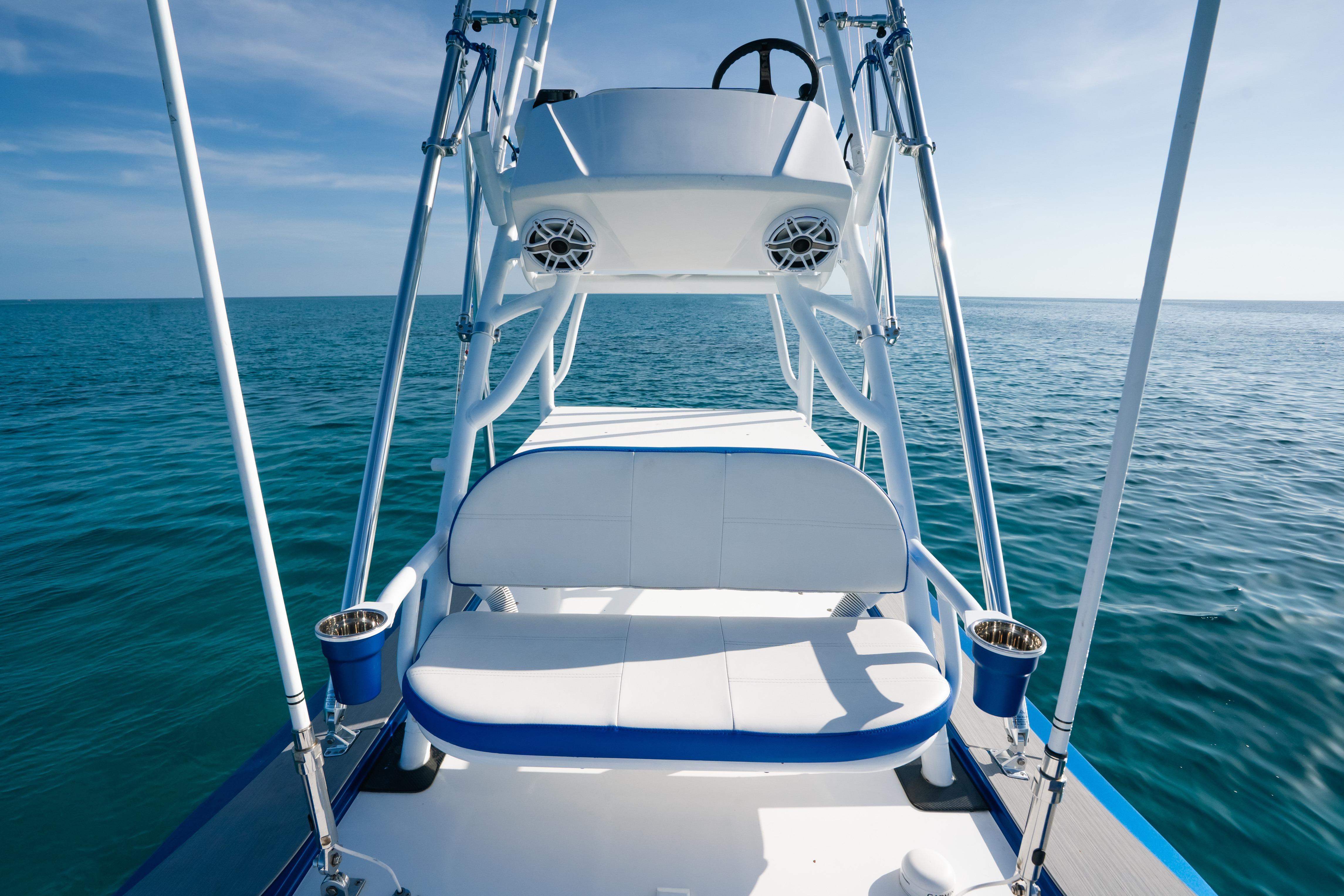 2022 Nor-Tech 392 Super Fish boat on open sea, featuring sleek design and comfortable seating.