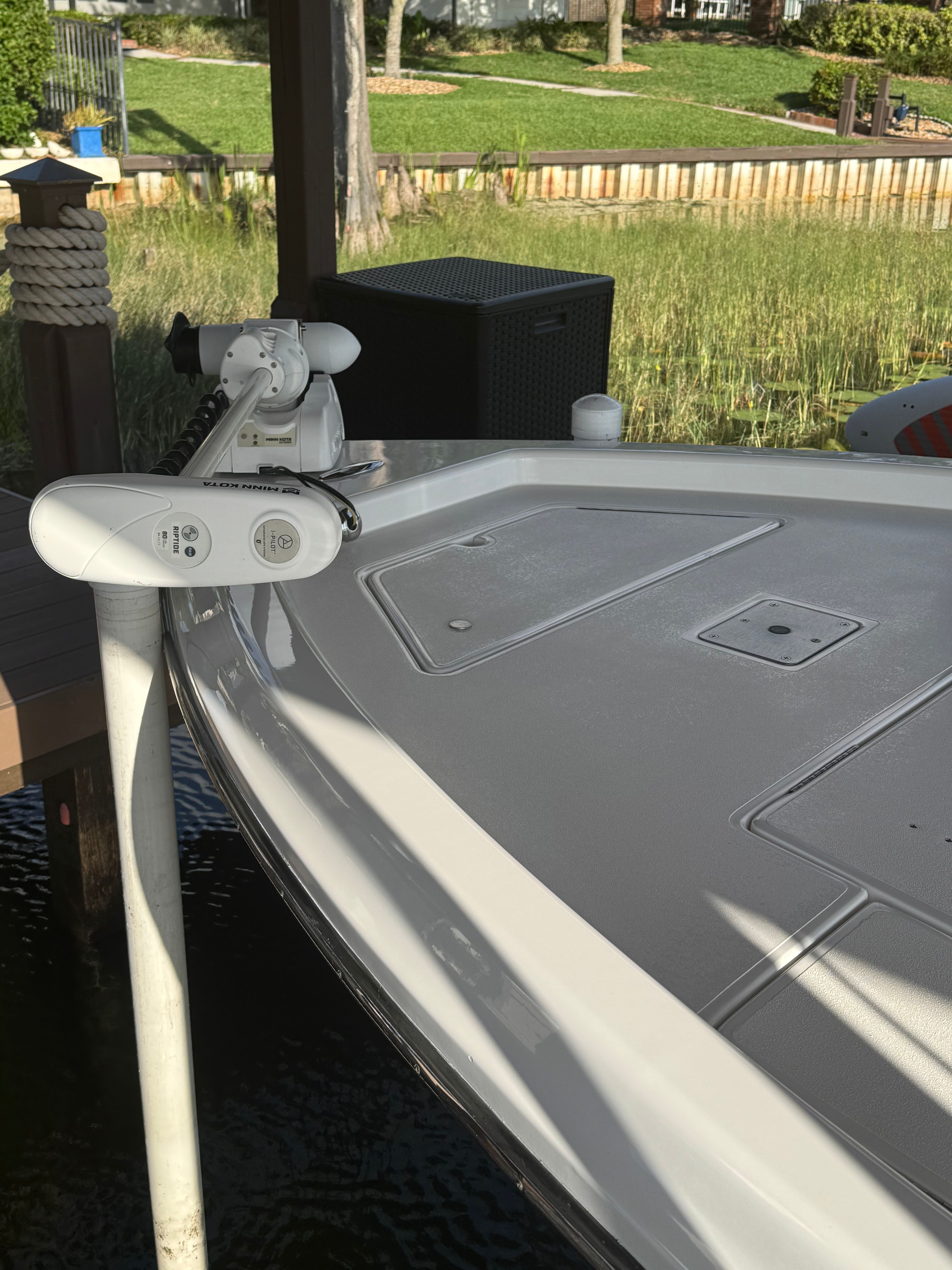 ShearWater LTZ 2004 boat deck with motor, docked at pier.