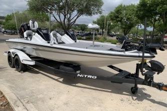 2026 Nitro Z21 XL Pro boat on trailer, parked outdoors.
