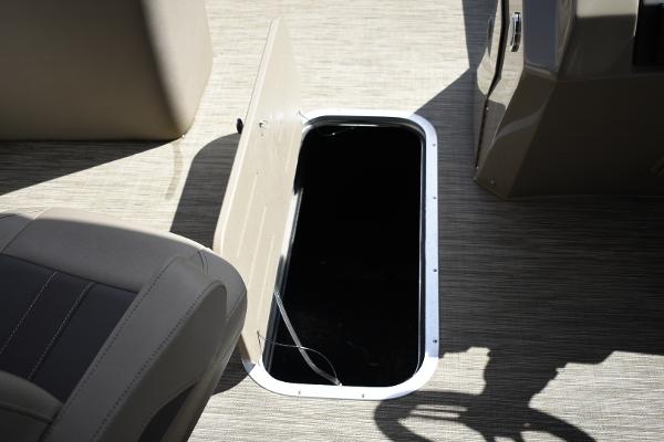2023 Bennington 22 SXCW boat storage compartment.