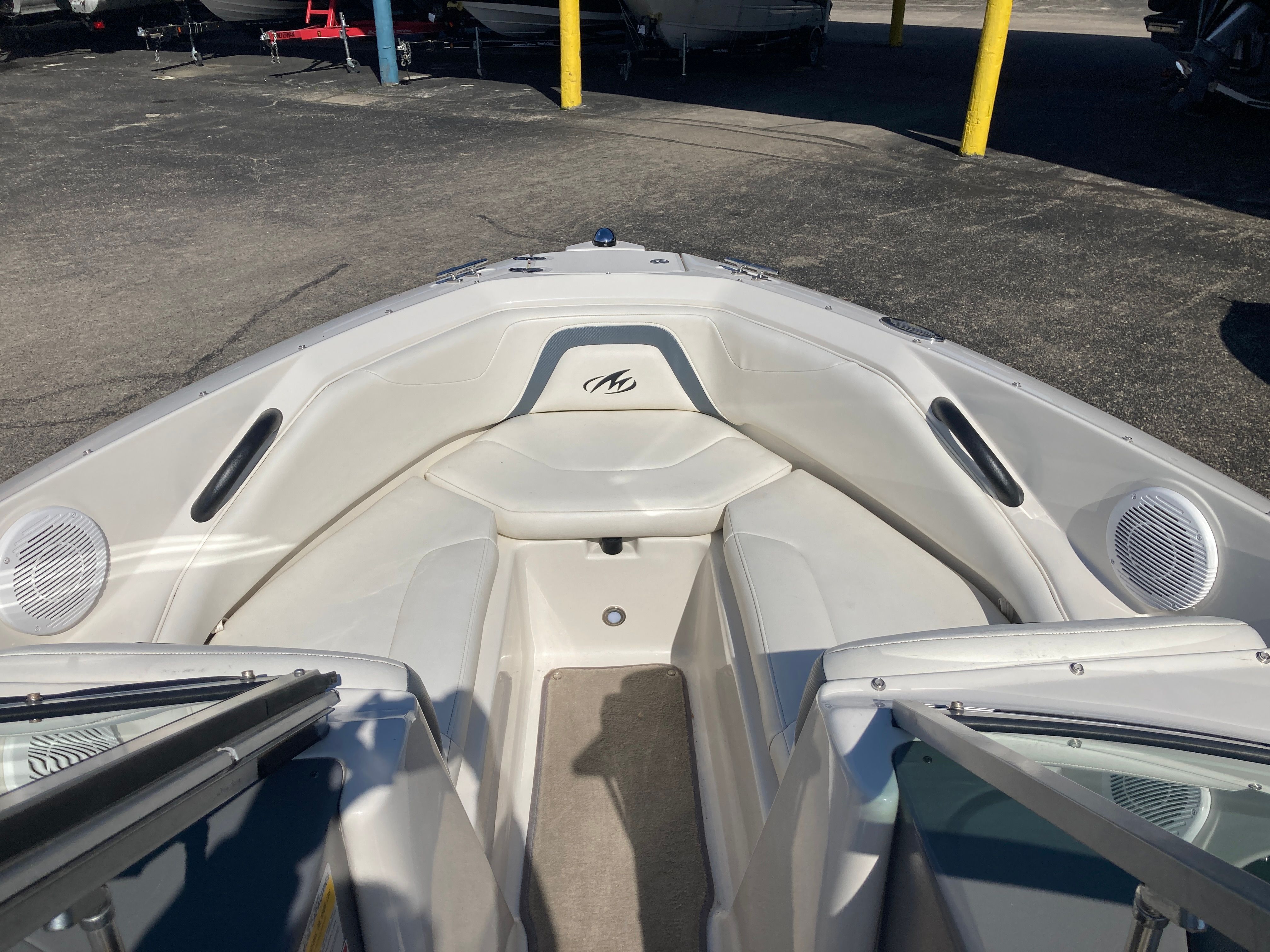 Interior view of a 2012 Monterey 204FS boat with white seating.