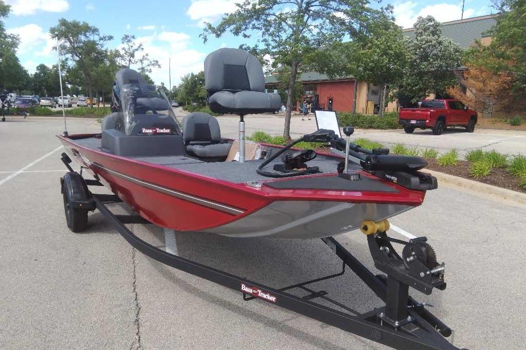 2026 Tracker Bass Tracker Classic XL boat on trailer in parking lot.