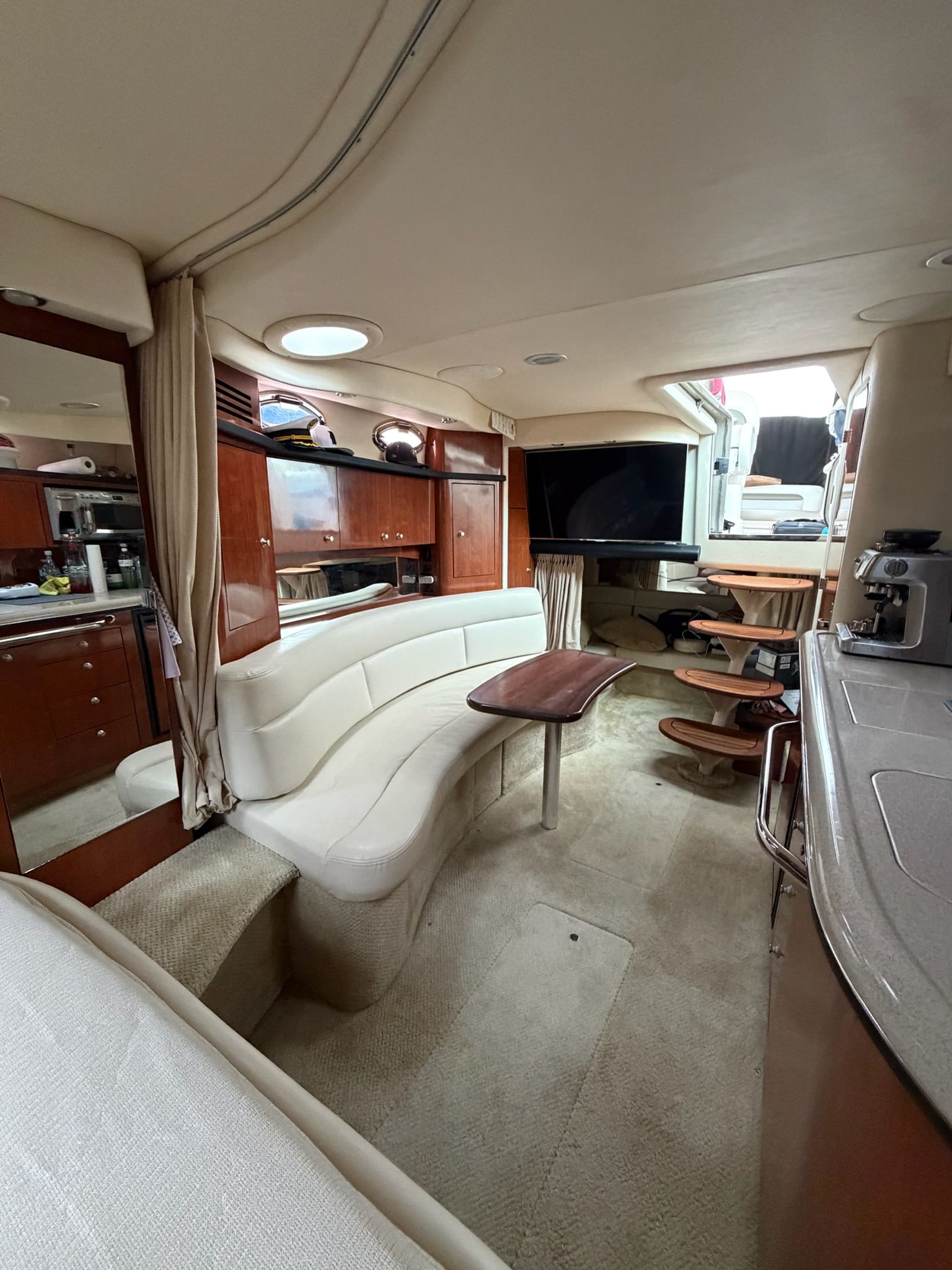 Interior of a 2007 Sea Ray 340 Sundancer yacht with elegant furnishings.