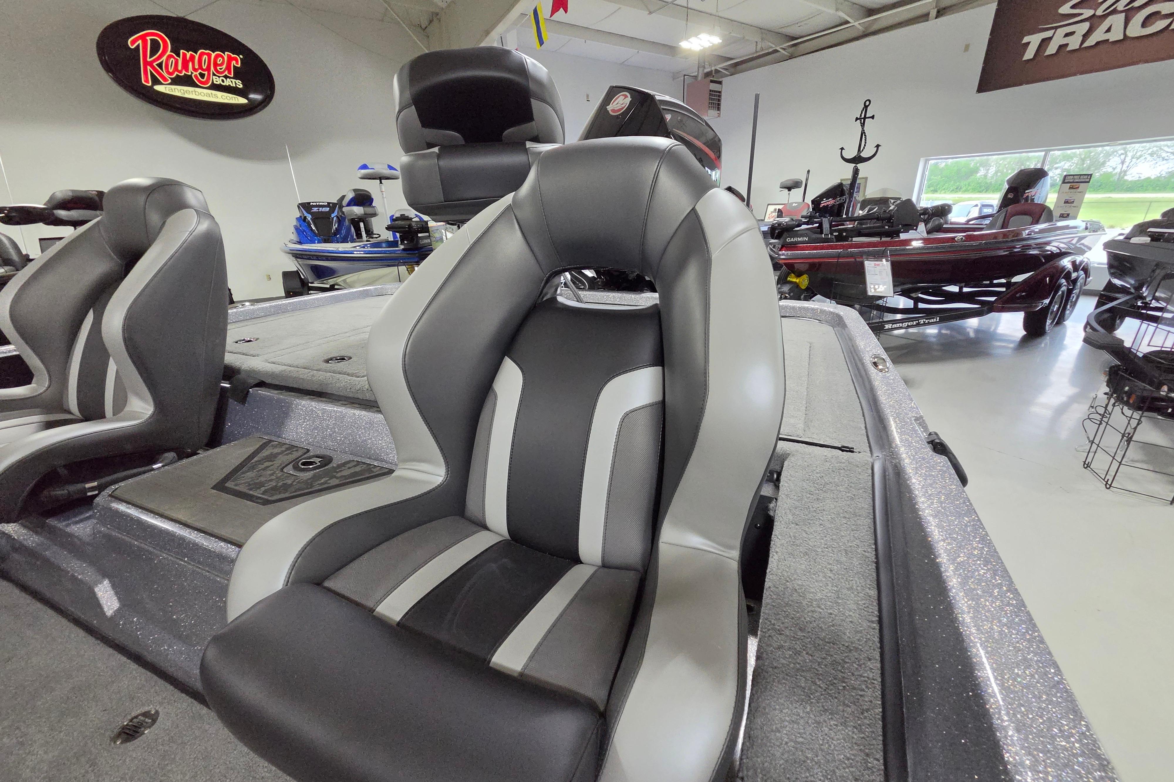 2026 Nitro Z19 XL boat interior with sleek gray seating in showroom.