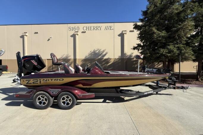 2026 Nitro Z21 XL Pro boat on trailer, parked outside building on Cherry Avenue.