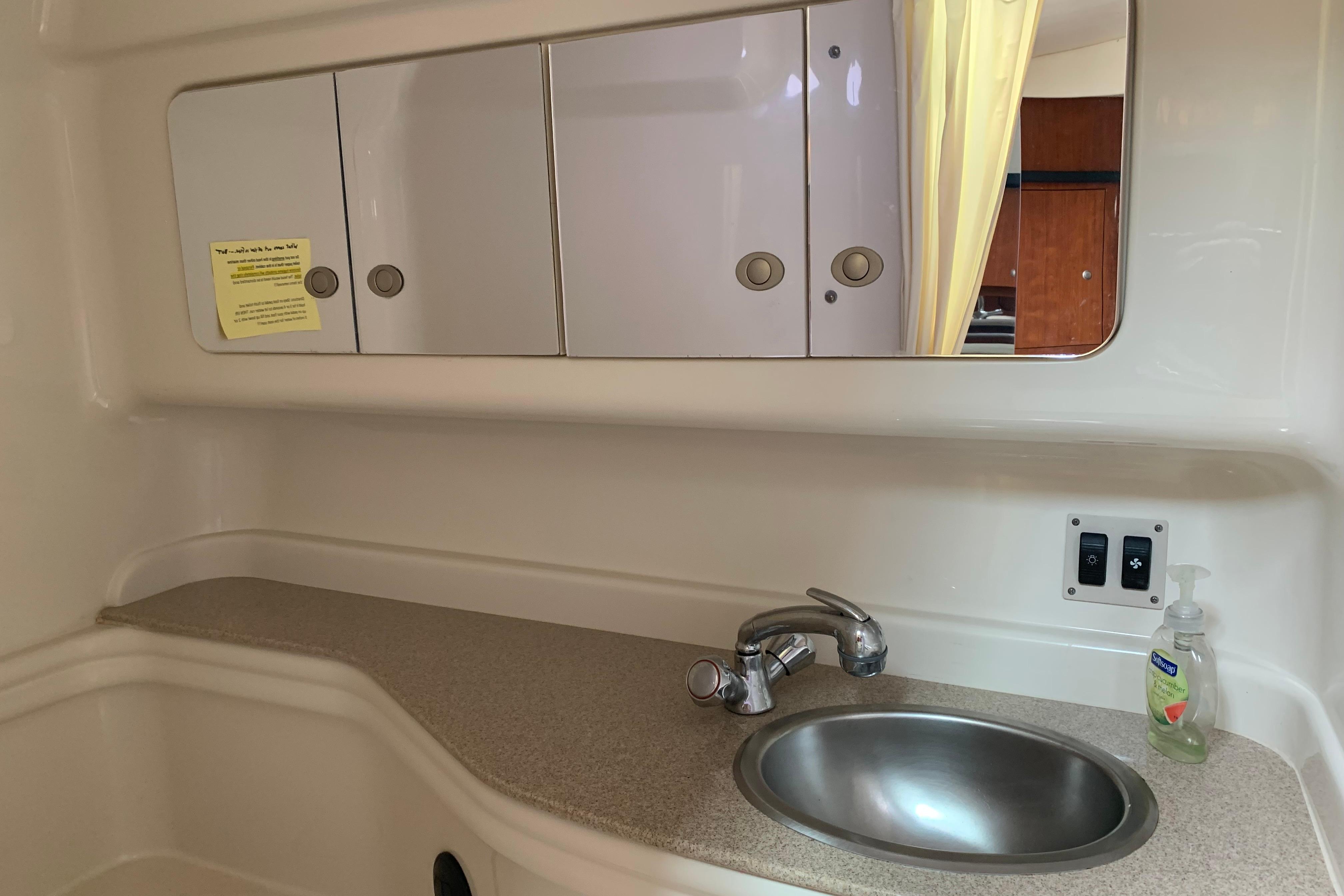 Bathroom sink area in a 2007 Sea Ray 340 Sundancer yacht.