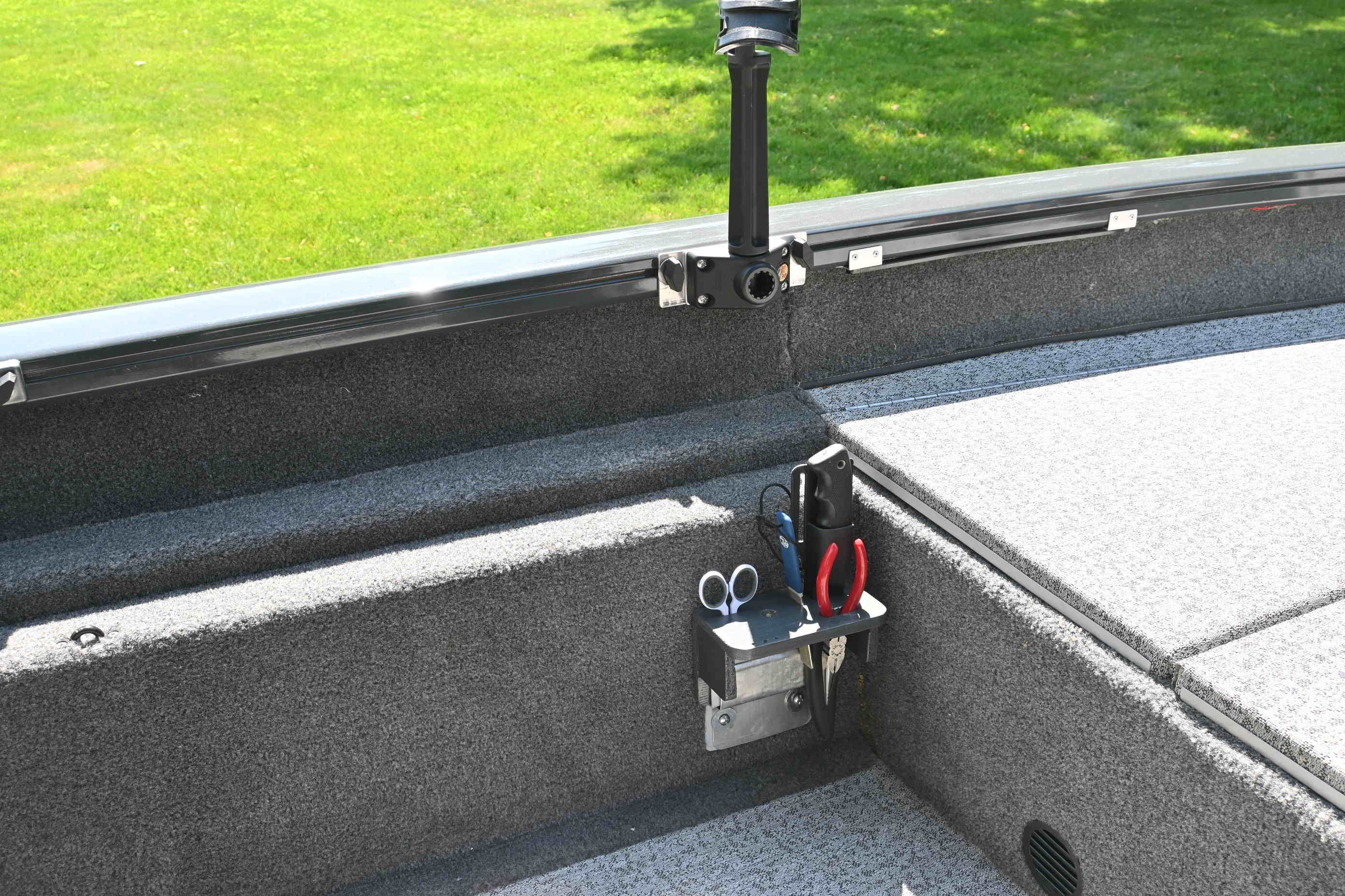 Interior view of a Tracker Pro 175 TF boat with fishing gear.