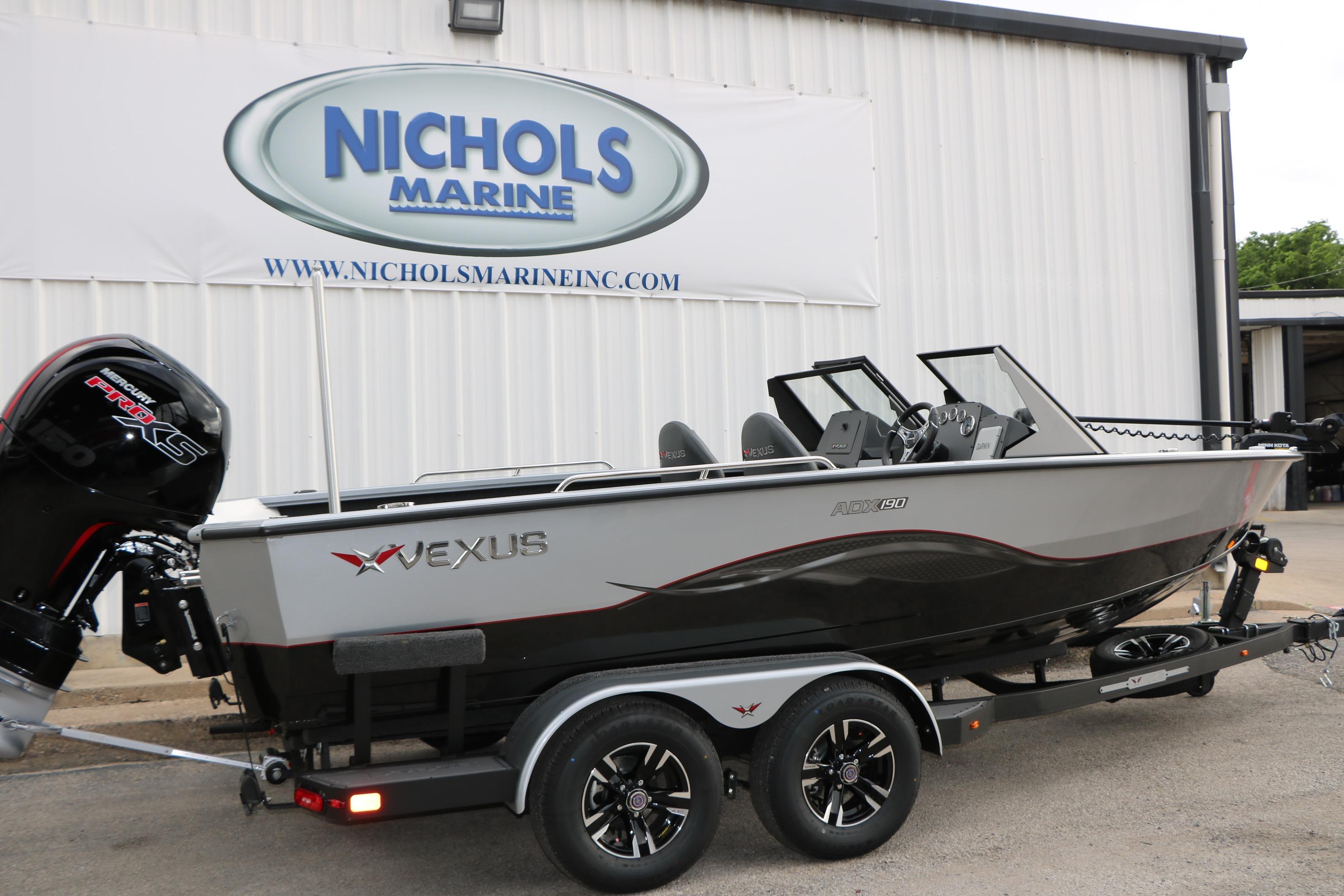 2026 Vexus ADX 190 boat on trailer at Nichols Marine dealership.