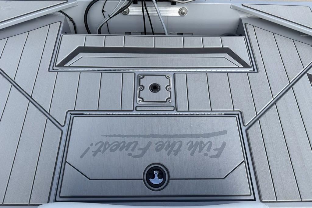 2026 Tracker Bass Tracker Classic CC boat deck with sleek gray finish and modern design.