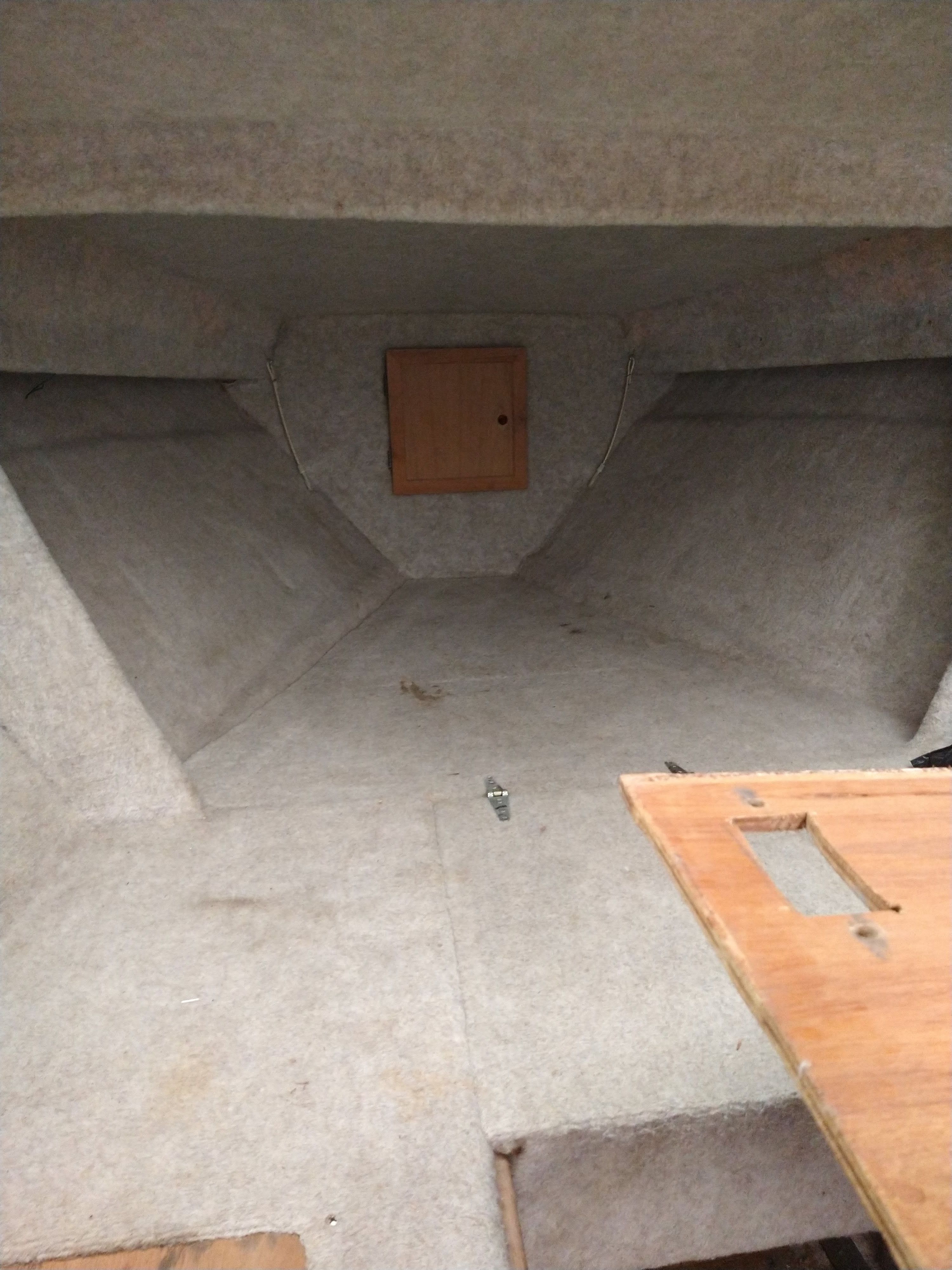 Interior of a 1986 Corsa Performance Boat, empty and unfurnished.