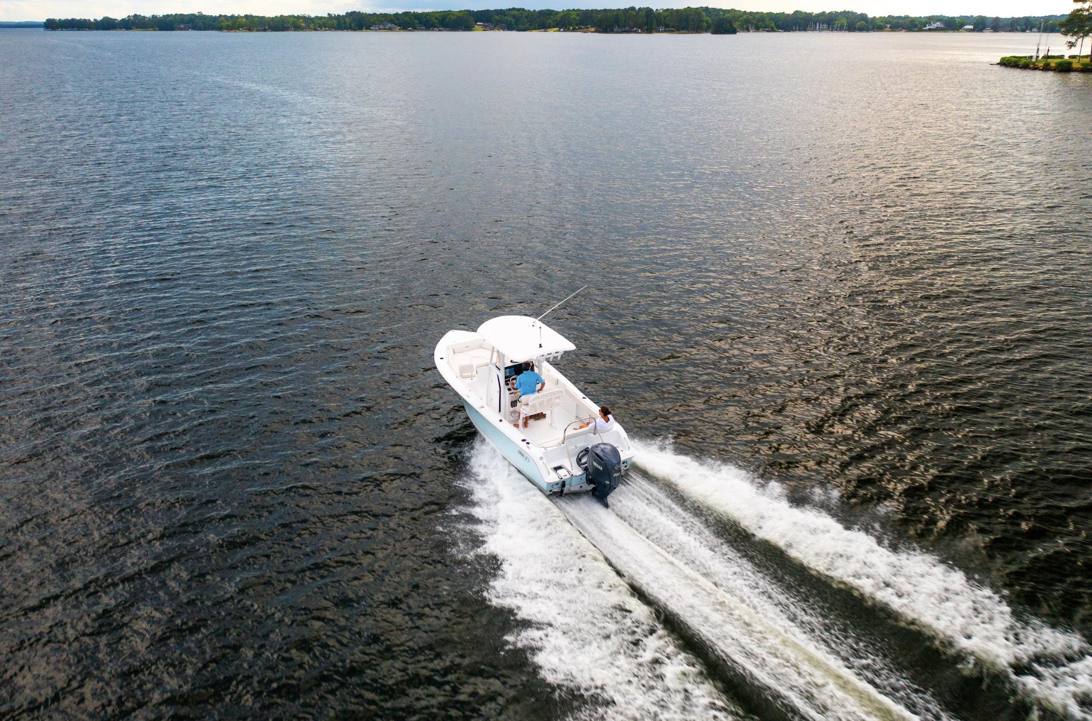 2025 Sea Hunt Ultra 229 boat cruising on open water.