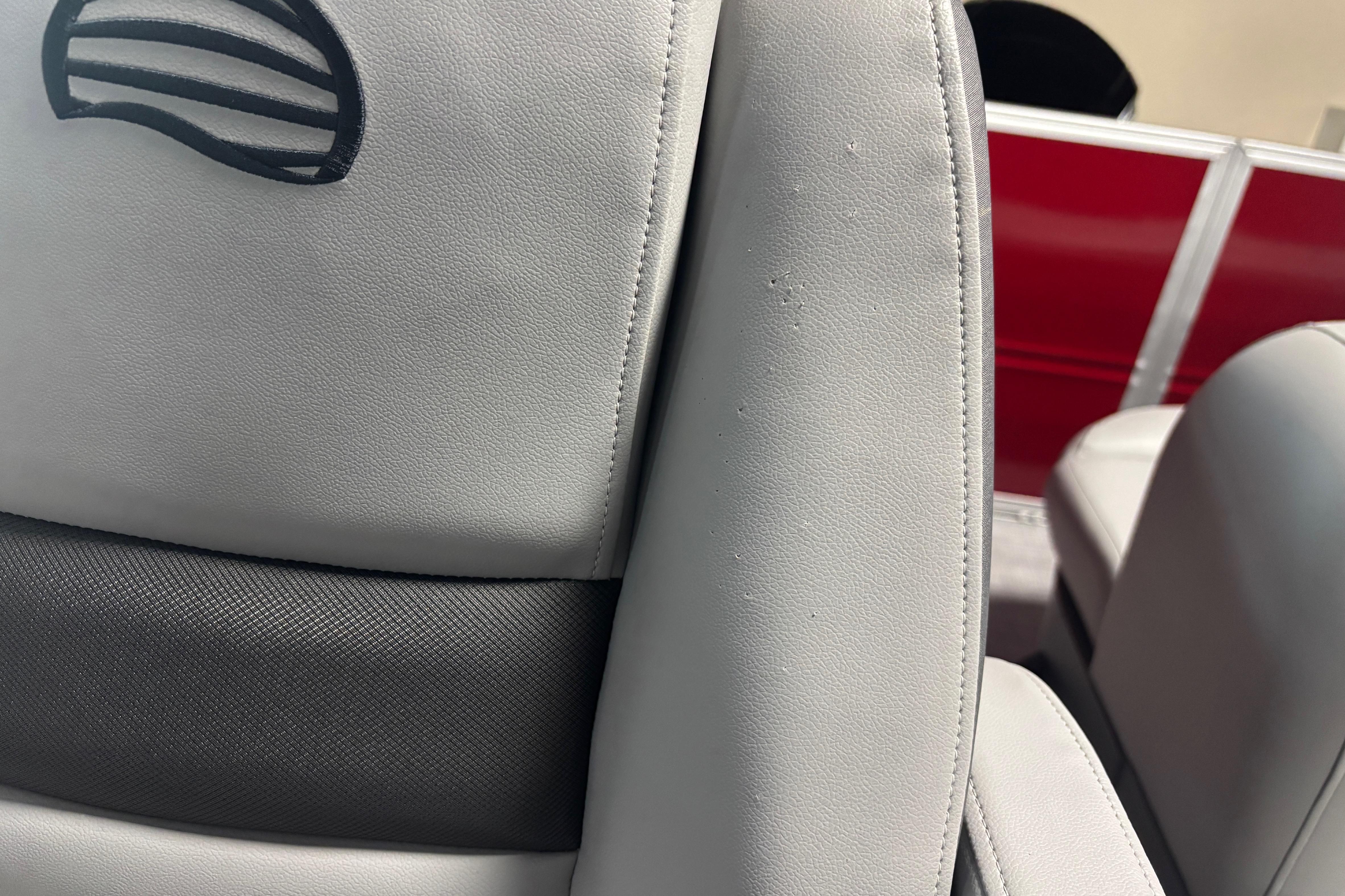 2026 Sun Tracker Party Barge 18 DLX, close-up of luxurious seating detail.