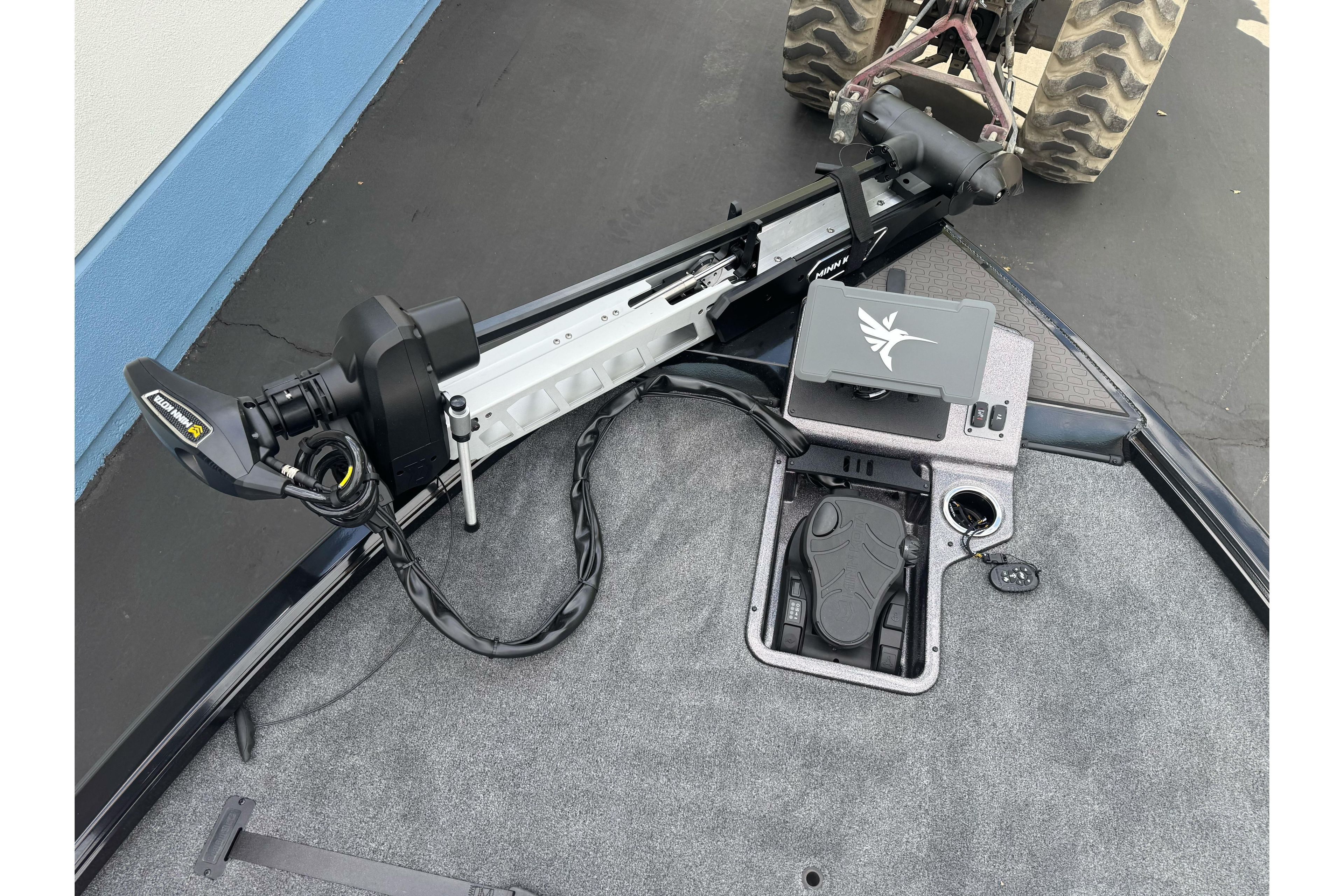 Trolling motor setup on Ranger ALPHA 208 boat, 2026 model, with control panel and foot pedal.