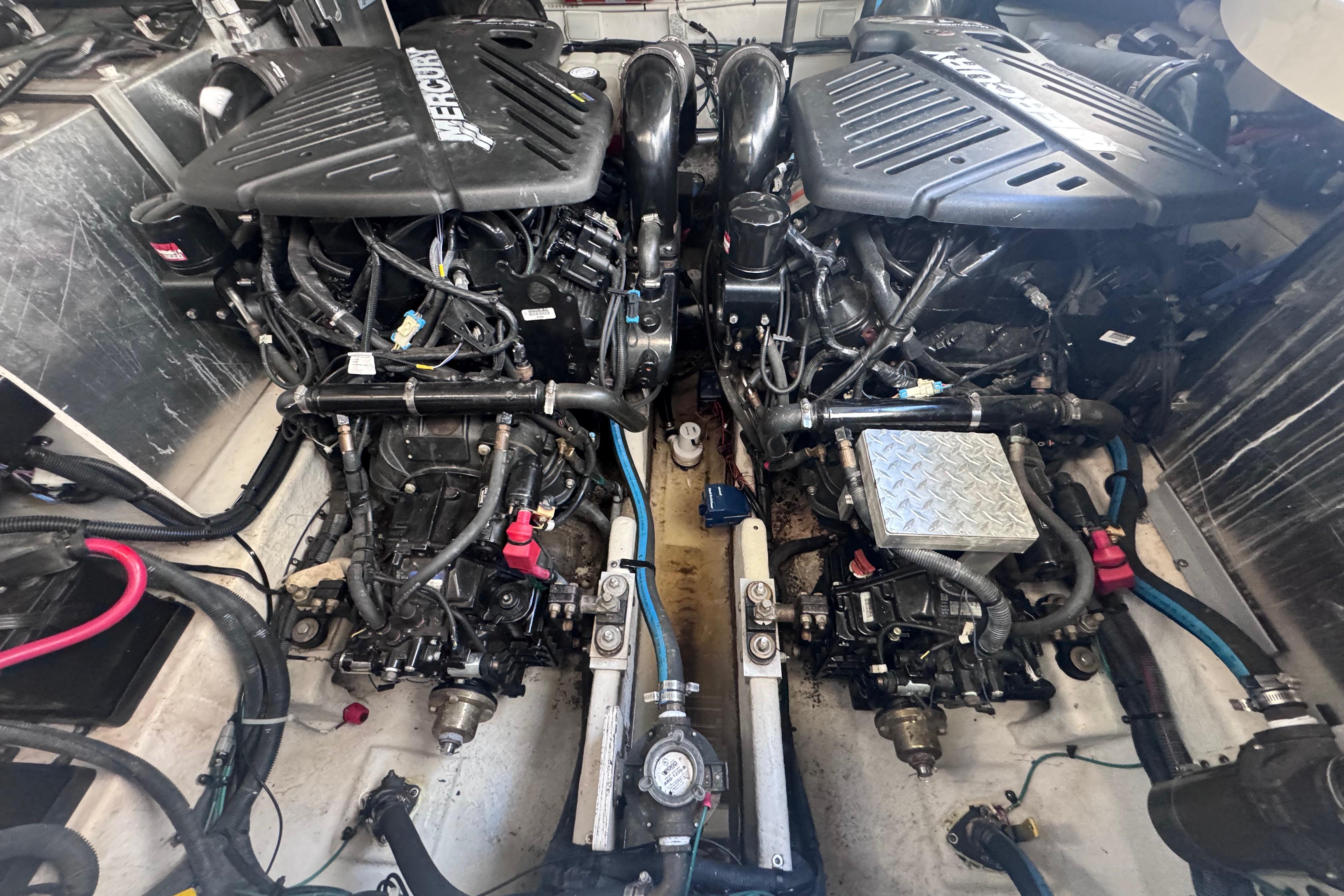 Twin engines in a 2008 Sea Ray 350 Sundancer boat engine room.