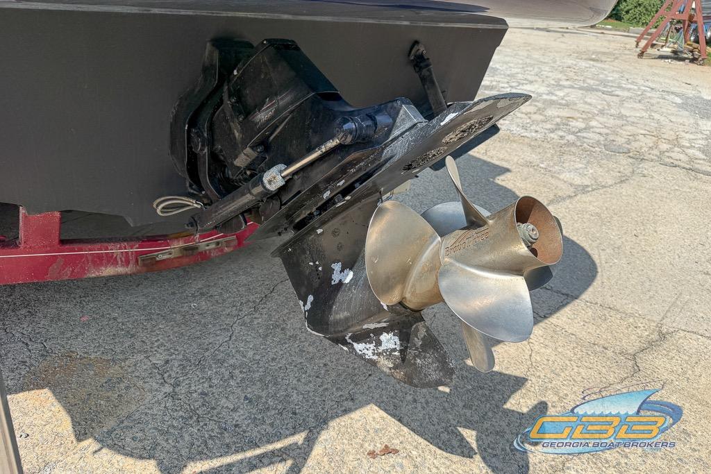 Propeller and stern drive of a 2006 Sea Ray Sundancer 260 boat on a trailer.