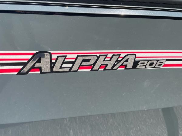Ranger ALPHA 208 logo on gray surface, 2025 model.