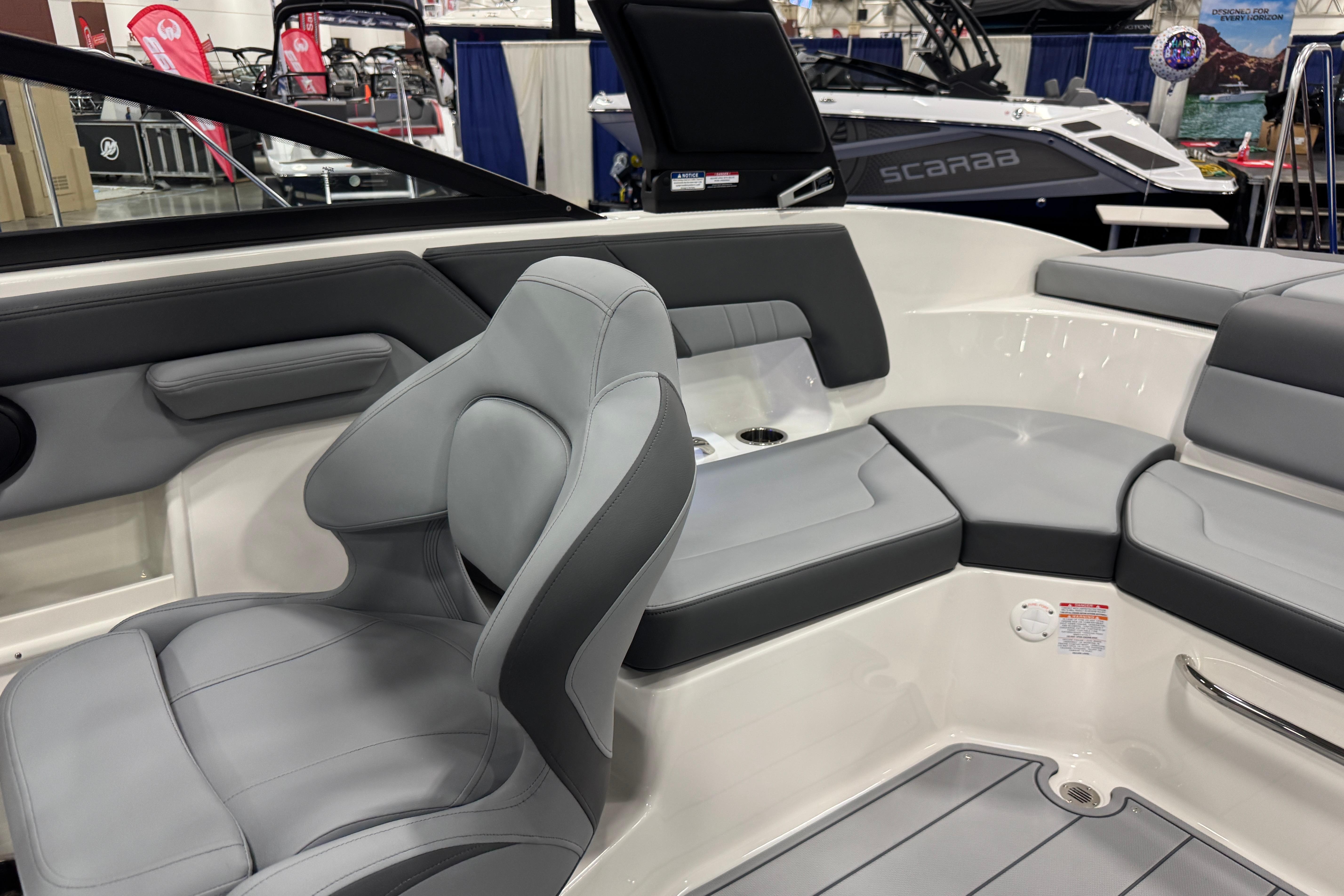 2026 Chaparral 23 SSi boat interior with gray seating and modern design.