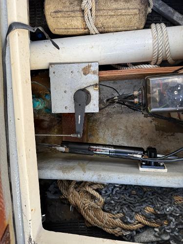 1978 Dyer 29 Trunk Cabin interior with ropes, chains, and mechanical components.