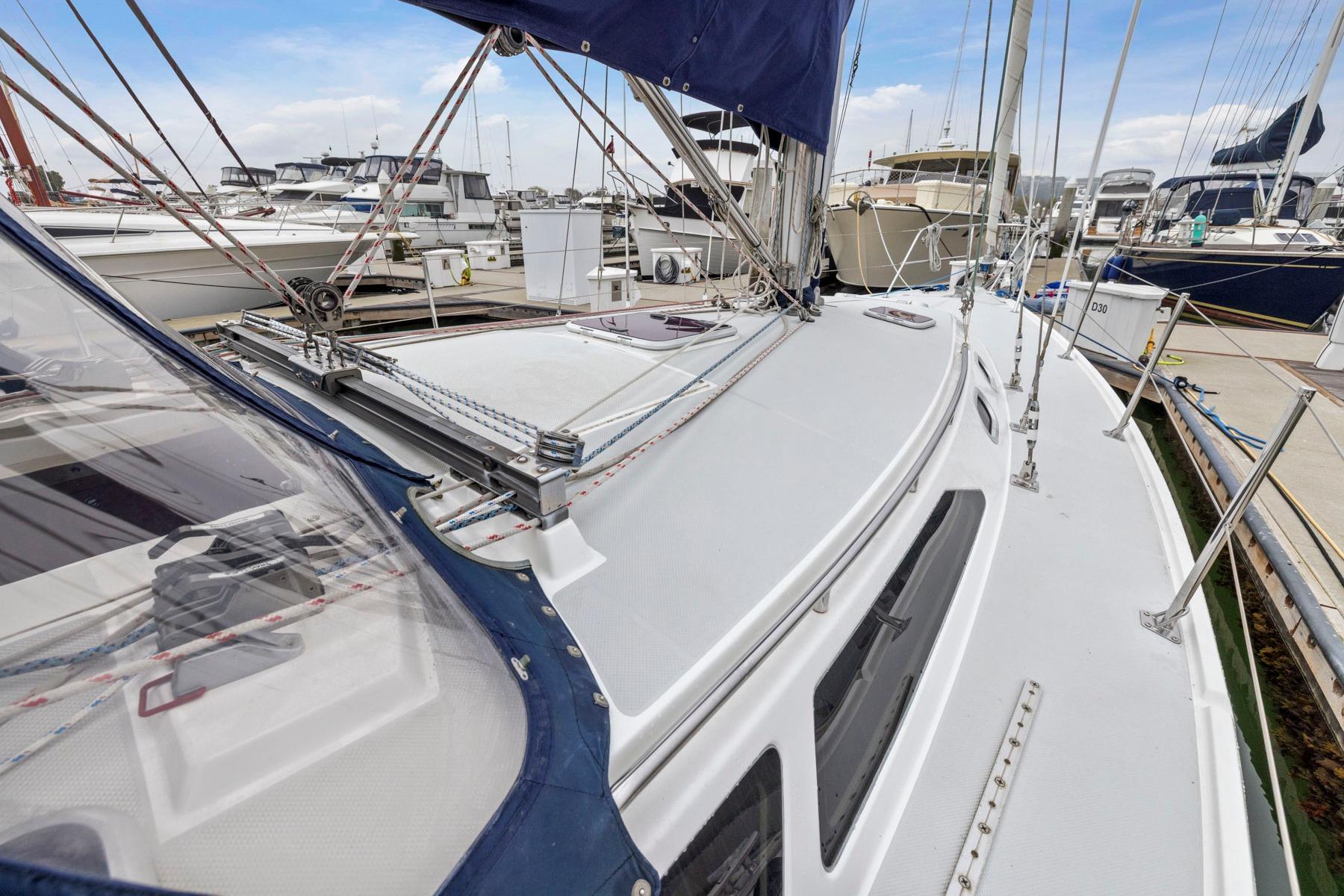 2004 Catalina 36 MkII sailboat docked at marina, showcasing deck and rigging.