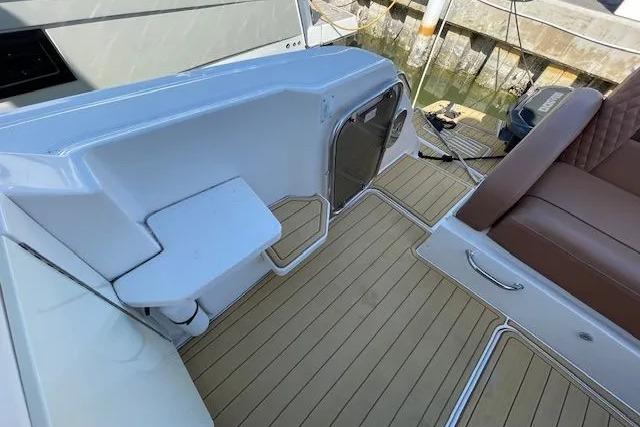 2016 Sea Ray Sundancer 510 yacht deck with seating and storage compartments.