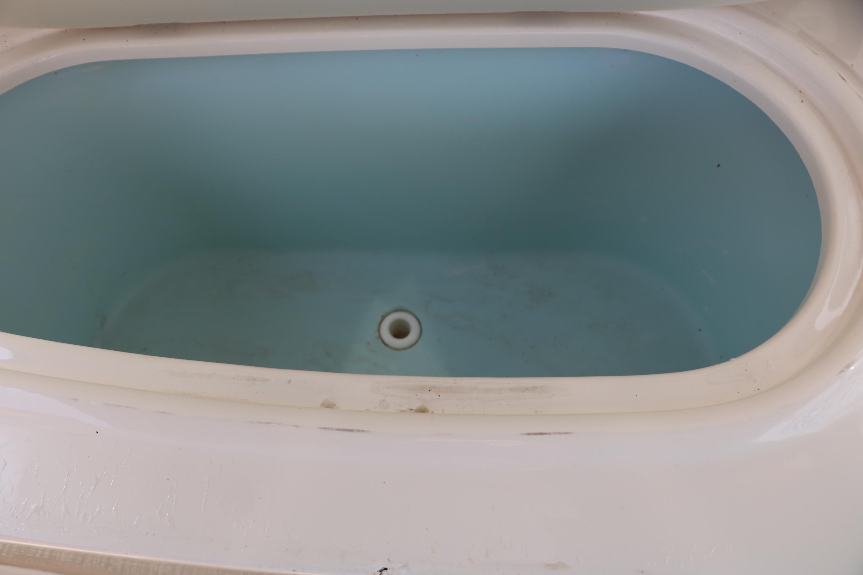 2022 Stingray 192 SC boat storage compartment, empty and clean.