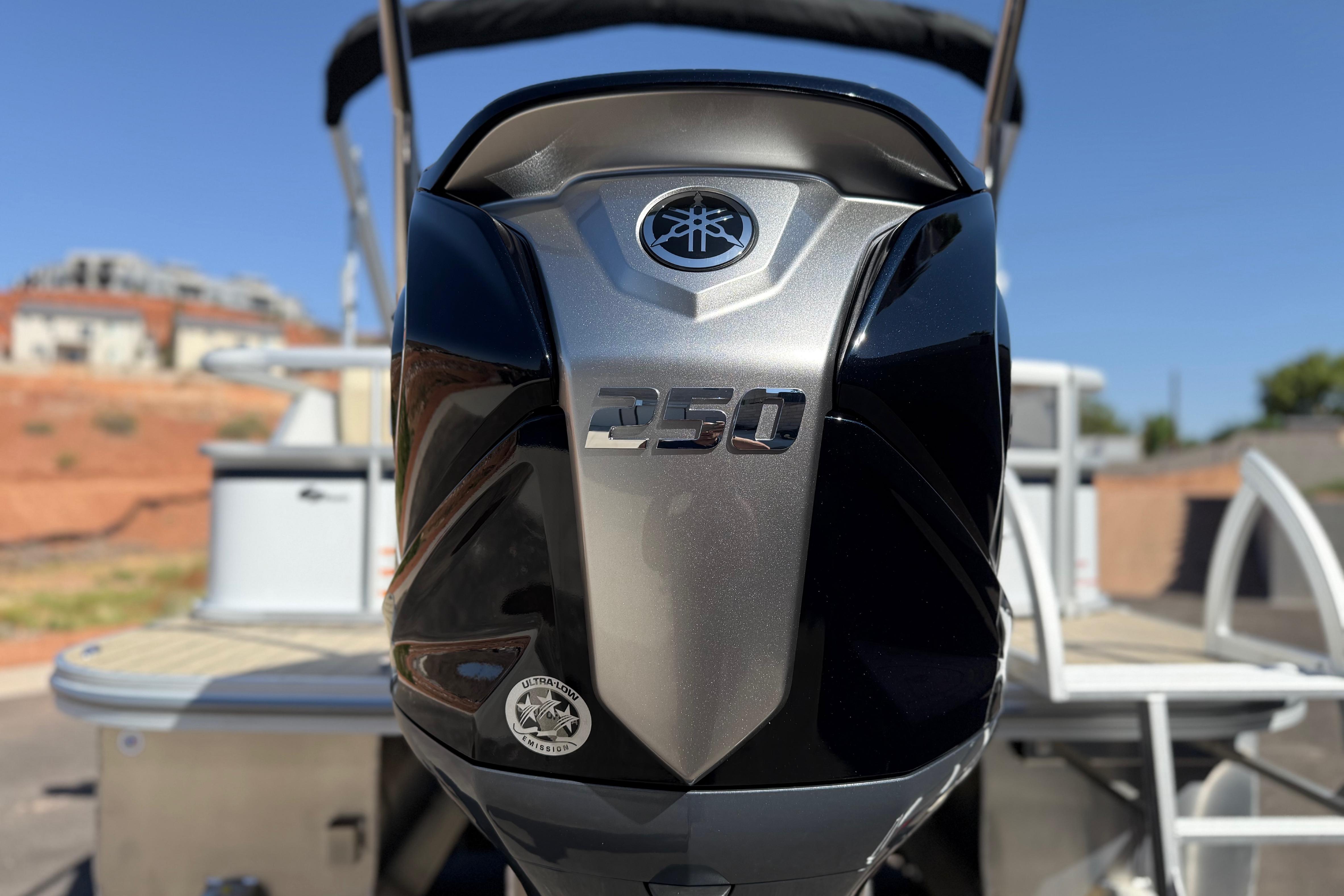 Close-up of a Yamaha 250 outboard motor on a 2026 SunCatcher Select 322SL boat.