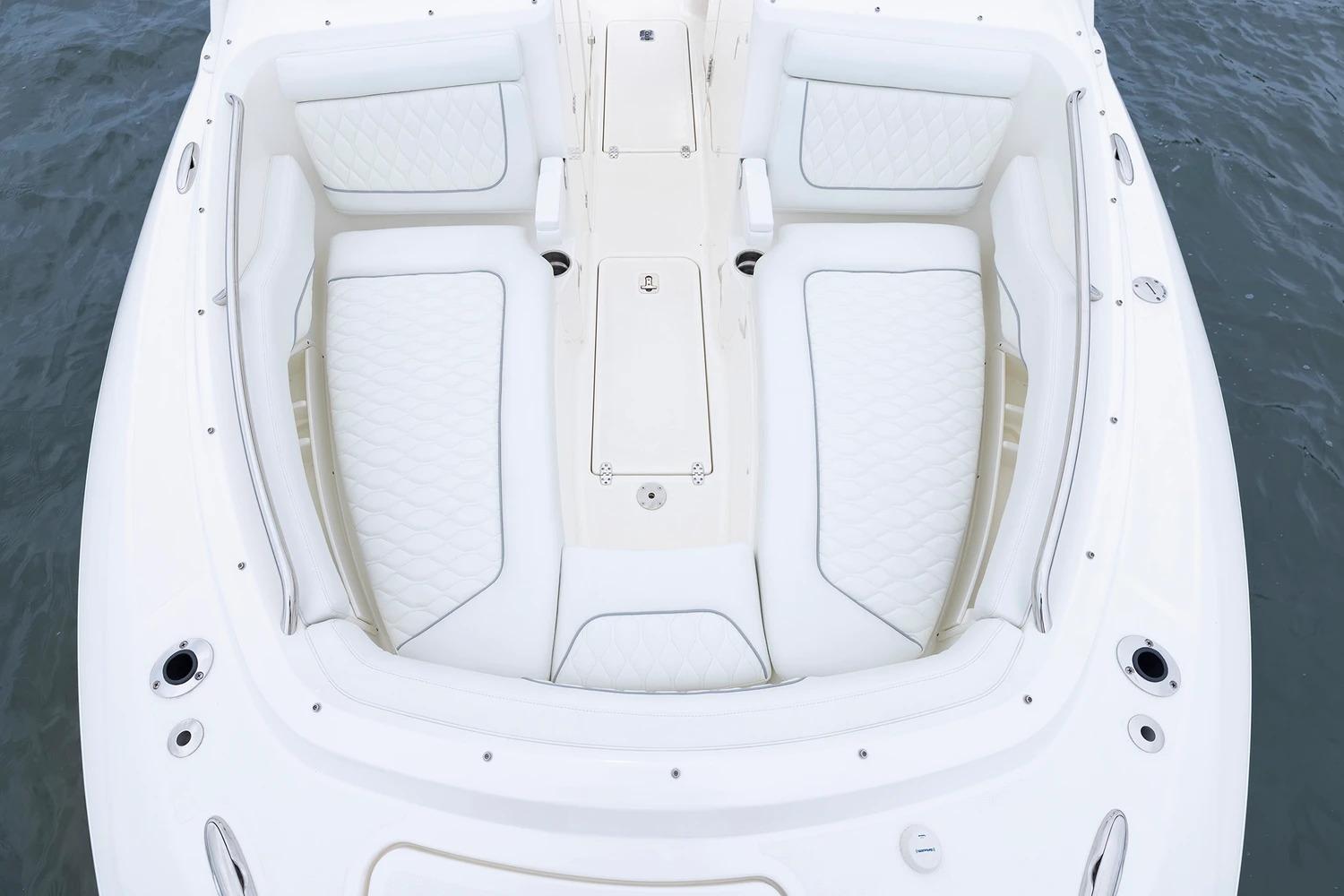 Manufacturer Provided Image: 2026 Pursuit DC 286 Dual Console boat with white cushioned seating on water.