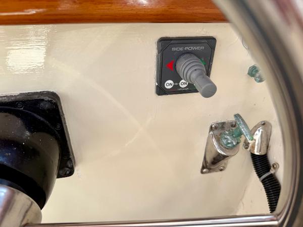 Control panel of a 1978 Dyer 29 Trunk Cabin boat with side power switch.