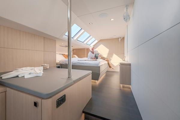 Luxurious interior of 2025 Privilege Signature 650 yacht with modern design and skylights.