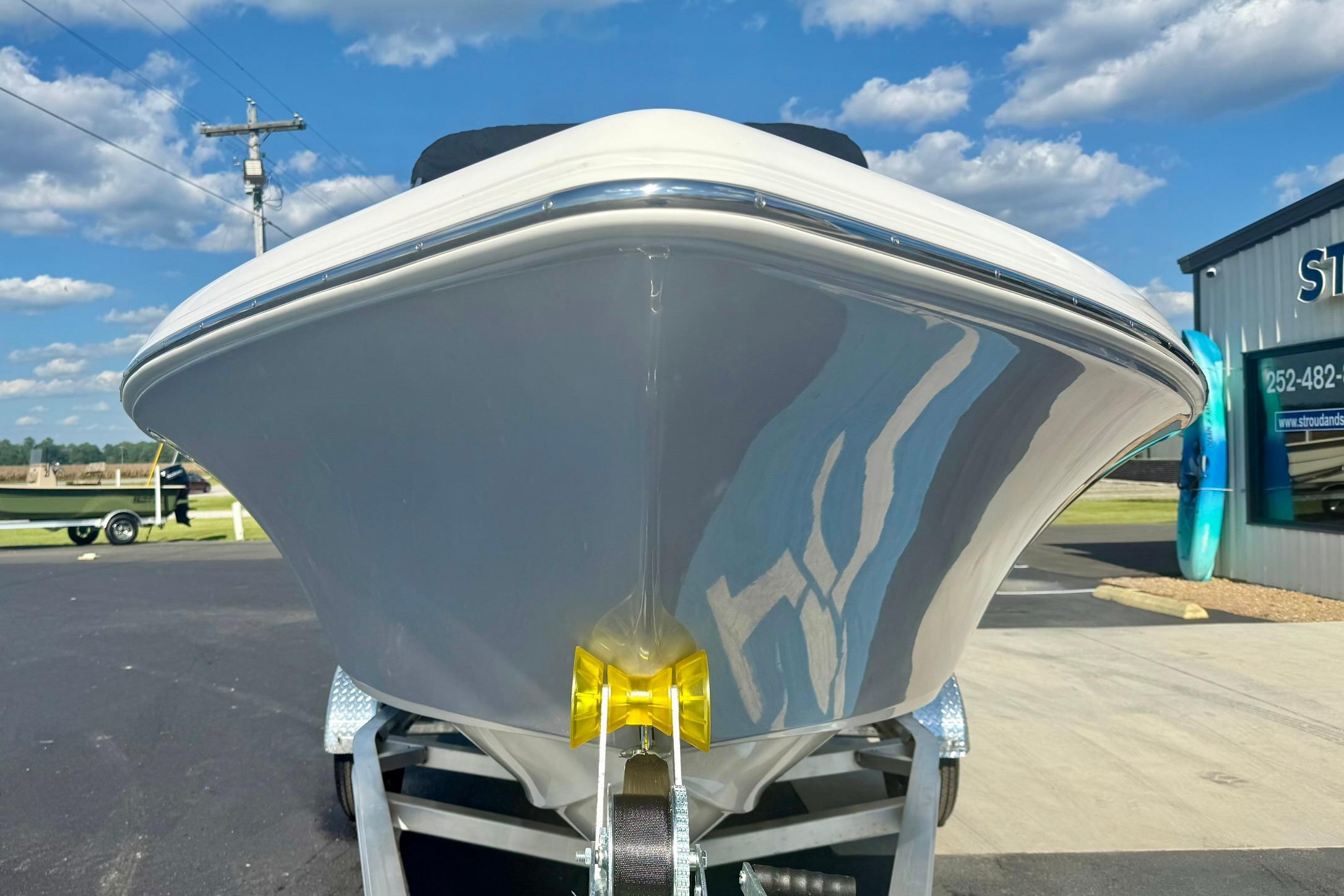 2026 Key West 189 FS boat on trailer, under clear blue sky.