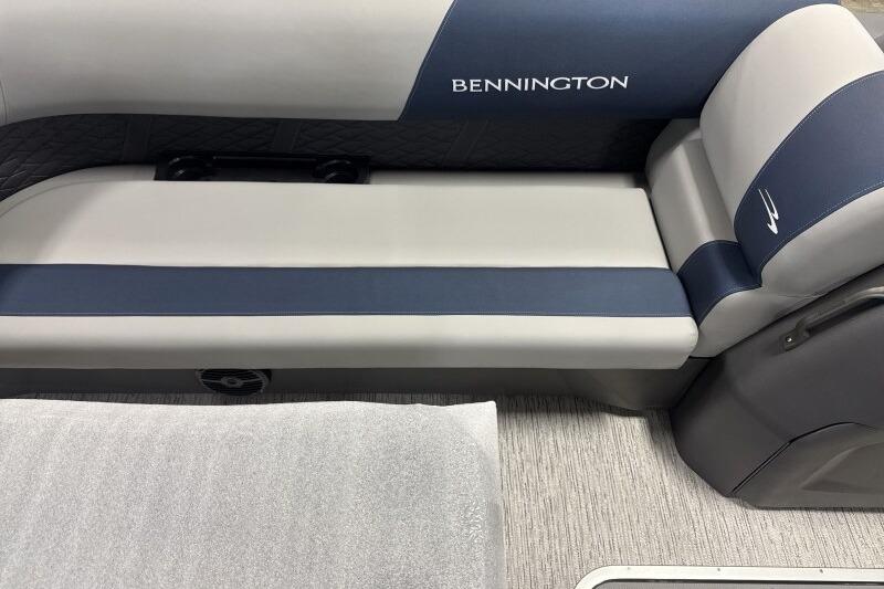 2026 Bennington 23 SSRSF boat interior with gray and blue seating.
