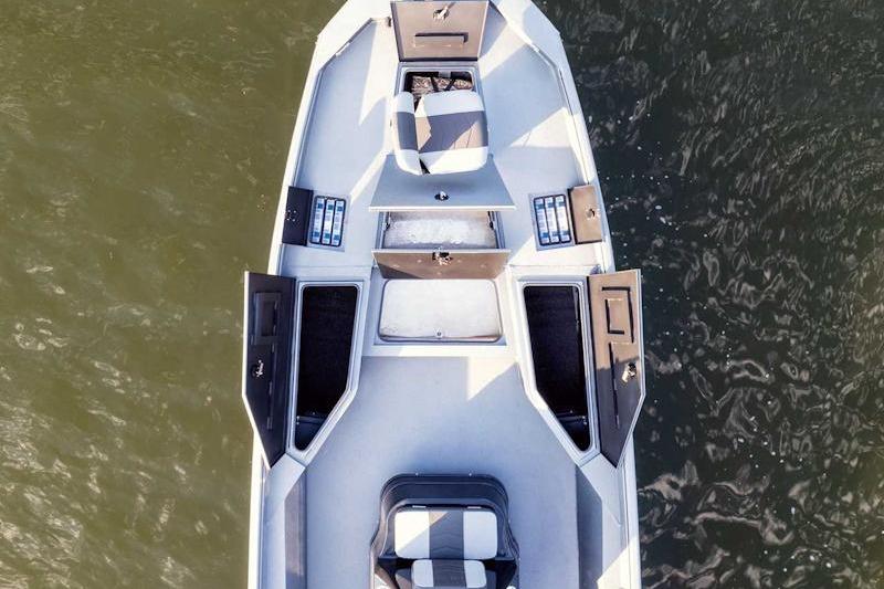Overhead view of 2026 Excel 230 Bay Pro Elite boat on water.