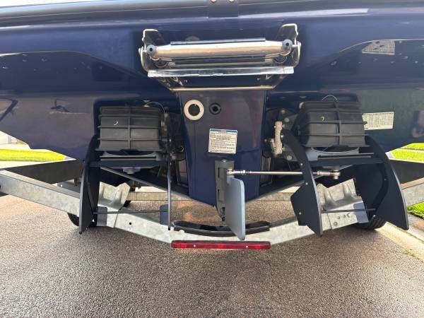 Rear view of a 2021 Yamaha AR250 boat on a trailer.