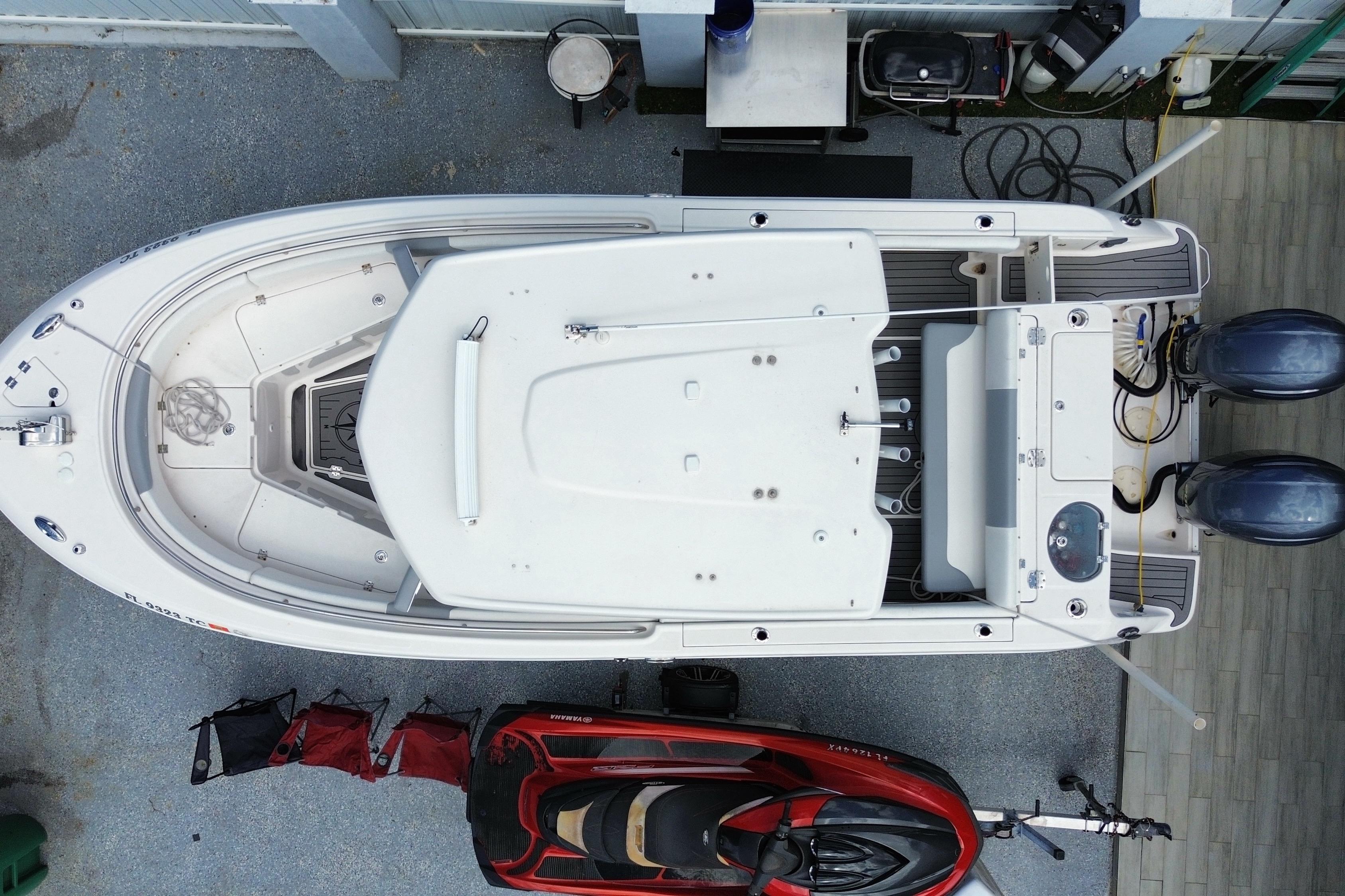 Overhead view of 2022 Robalo R242 Center Console boat docked.