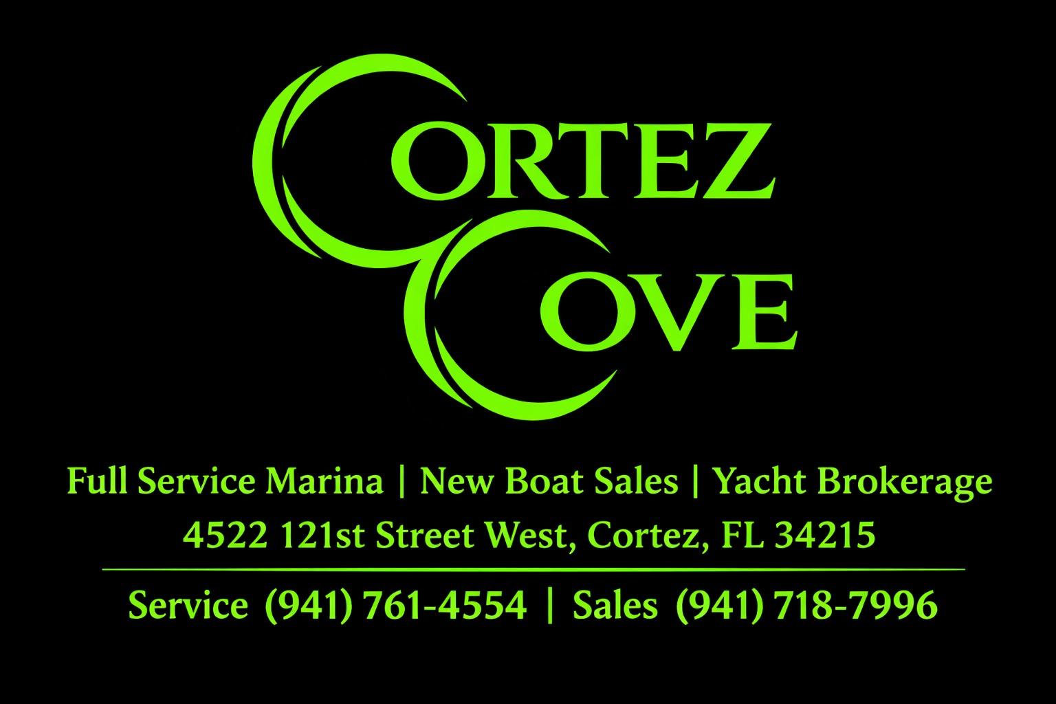 Cortez Cove Marina advertisement with contact details and services in bright green text.