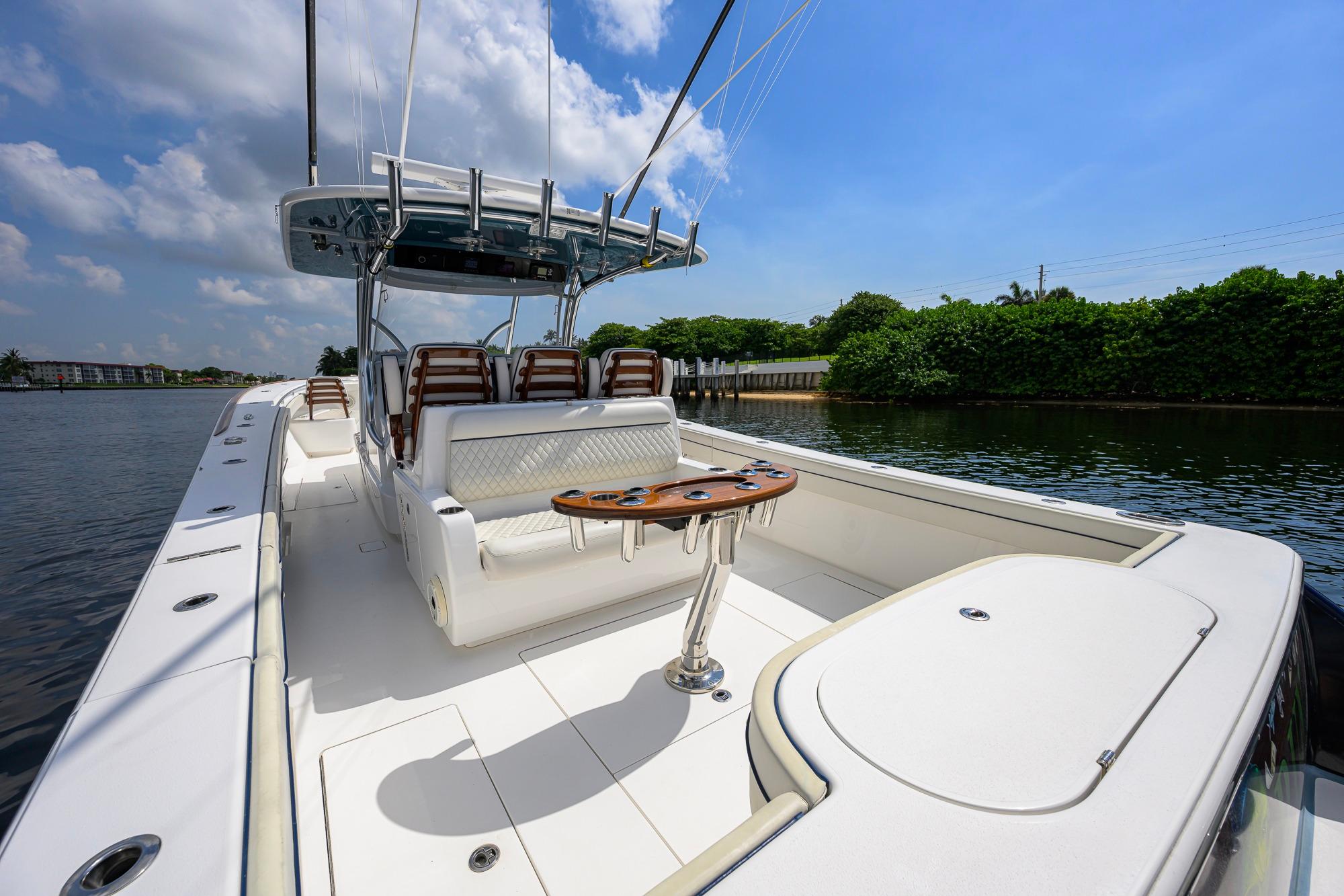2020 Valhalla Boatworks V-41 on calm water, featuring sleek design and comfortable seating.