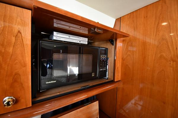 Built-in microwave and DVD player in Sunseeker Camargue 47 yacht, 1997 model.