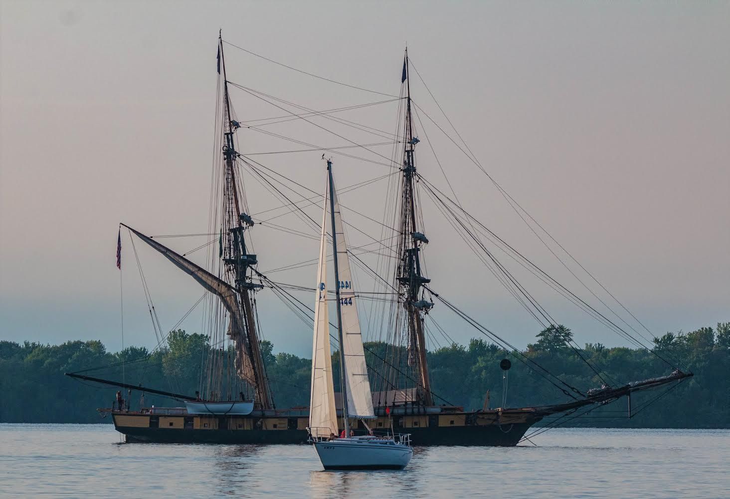 1984 Catalina 30 sailboat in front of historic ship.