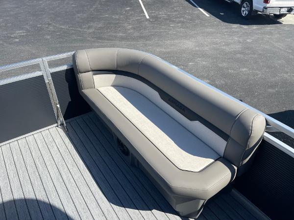 Armada Saphir 23CR 2025 boat seating, gray upholstery, docked on wooden deck.