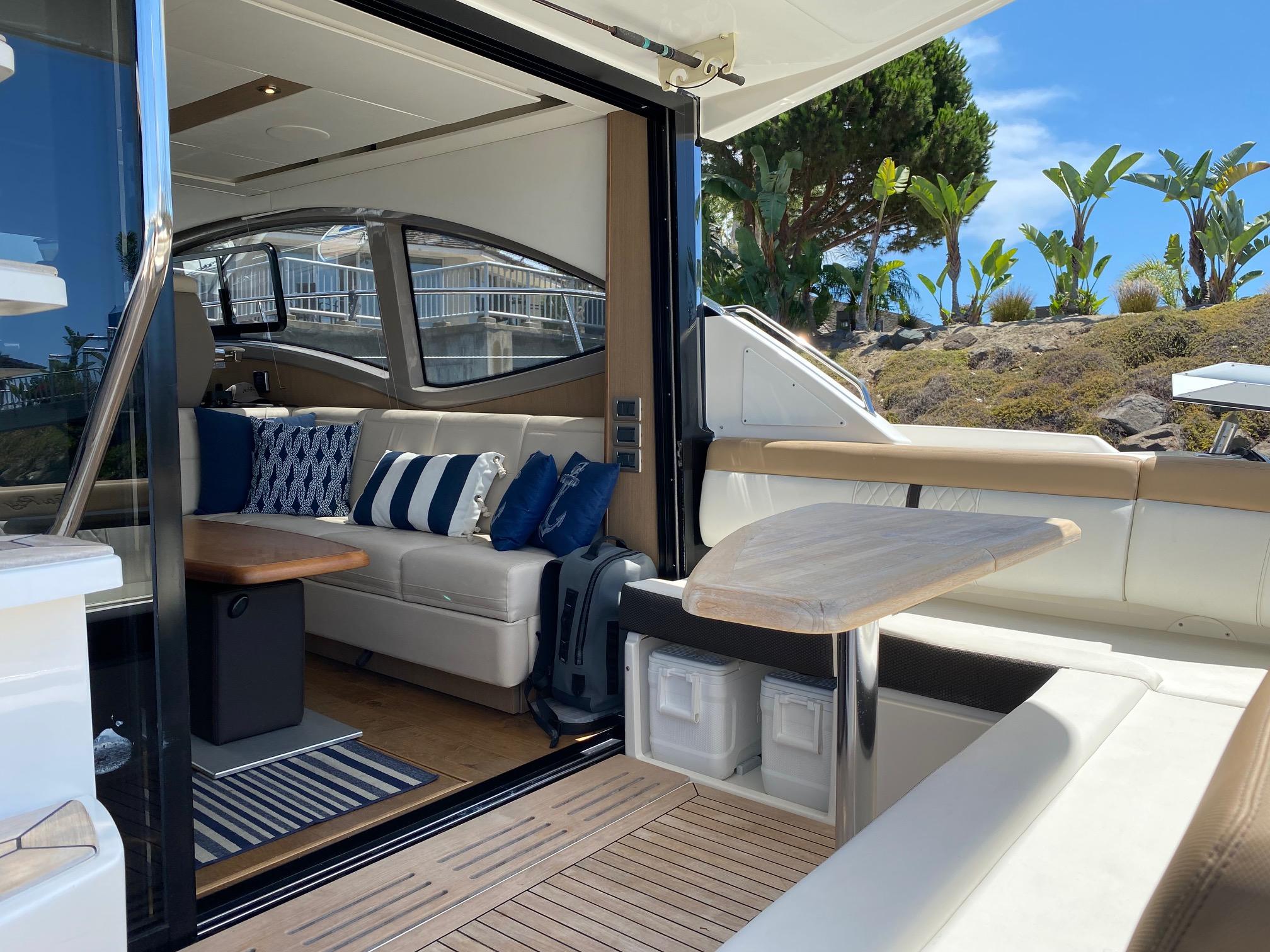 Luxurious 2018 Sea Ray 400 Fly yacht interior with elegant seating and modern design.