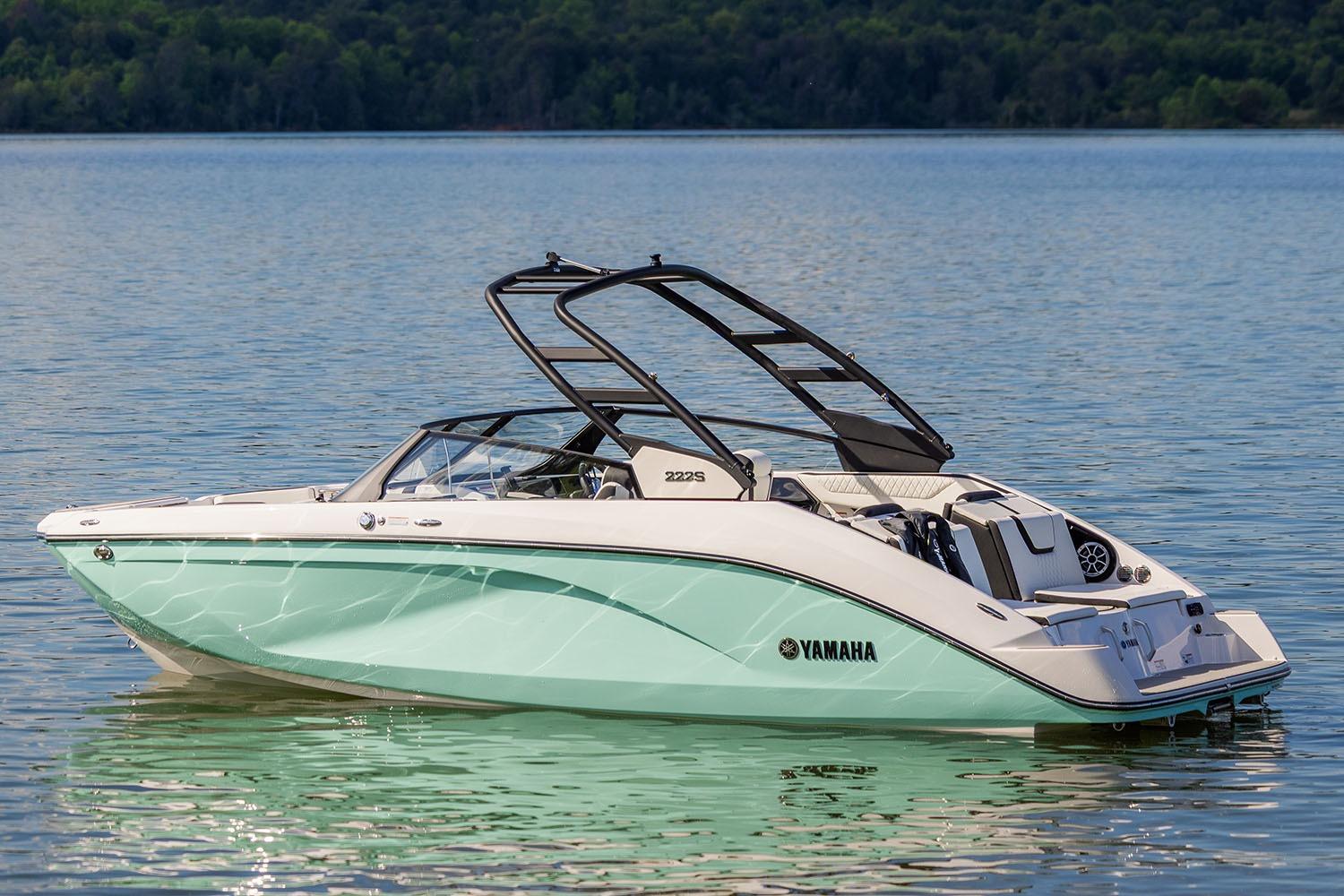 Manufacturer Provided Image: 2026 Yamaha Boats 222S on serene lake with lush forest backdrop.