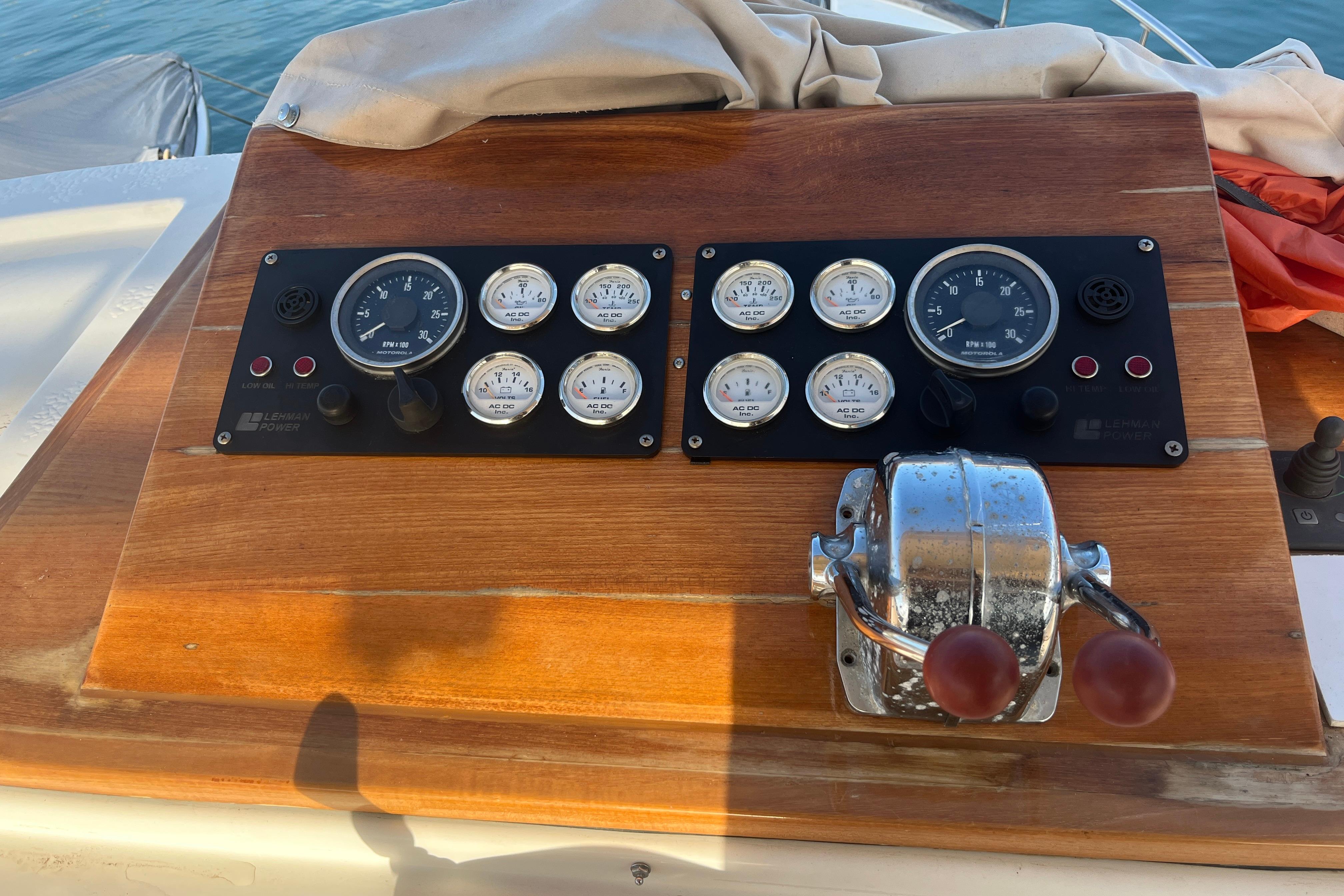 1979 Eurobanker 41 Trawler dashboard with gauges and controls on wooden panel.